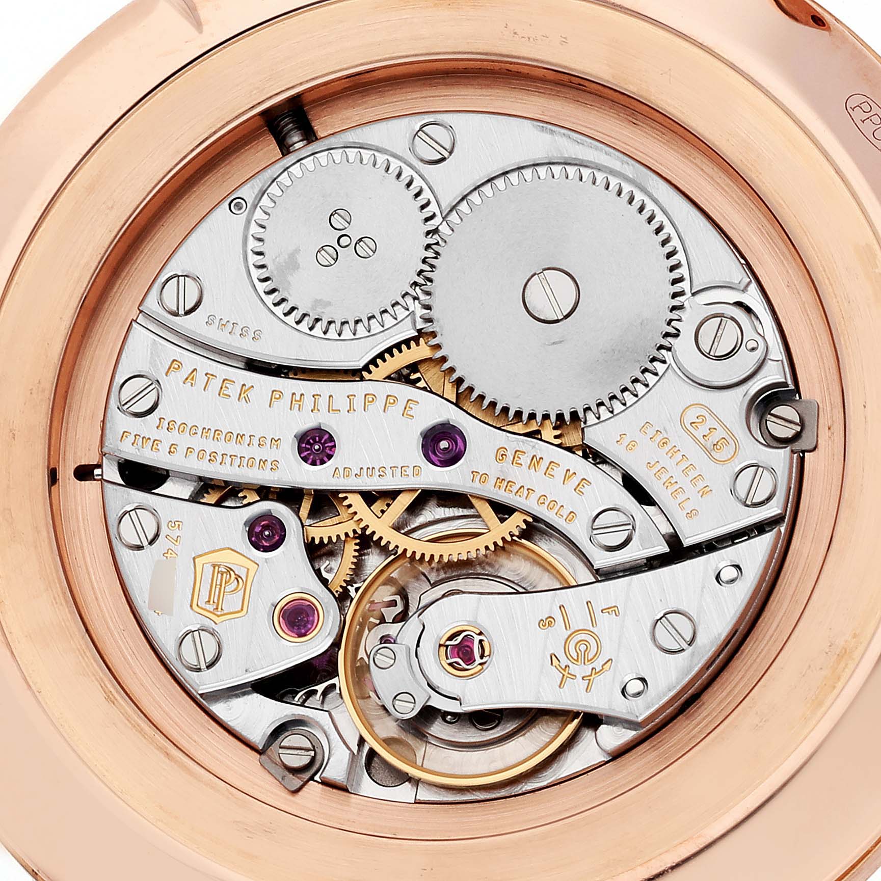 This image shows the intricate inner mechanism of the Patek Philippe Calatrava 5119R Men
s Rose Gold White Dial 5119R Men
s Rose Gold White Dial watch viewed from the back.