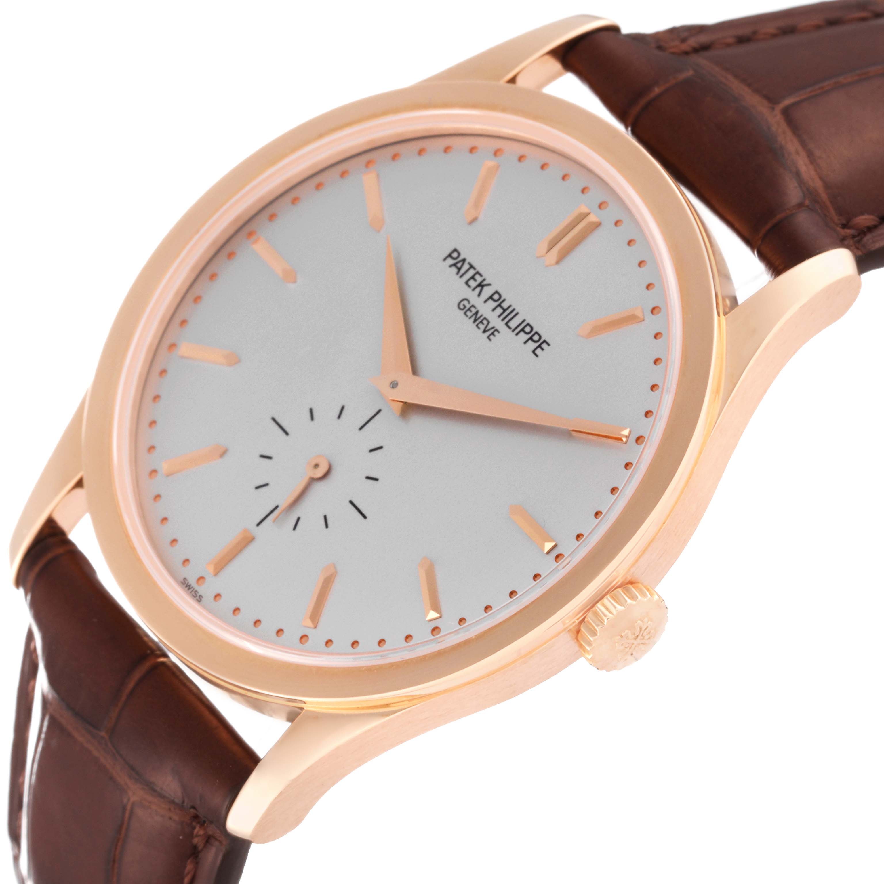This image shows a Patek Philippe Calatrava 5196R Men
s Rose Gold Silver Dial 5196R Men
s Rose Gold Silver Dial watch from an angled side view, highlighting the dial, crown, and leather strap.