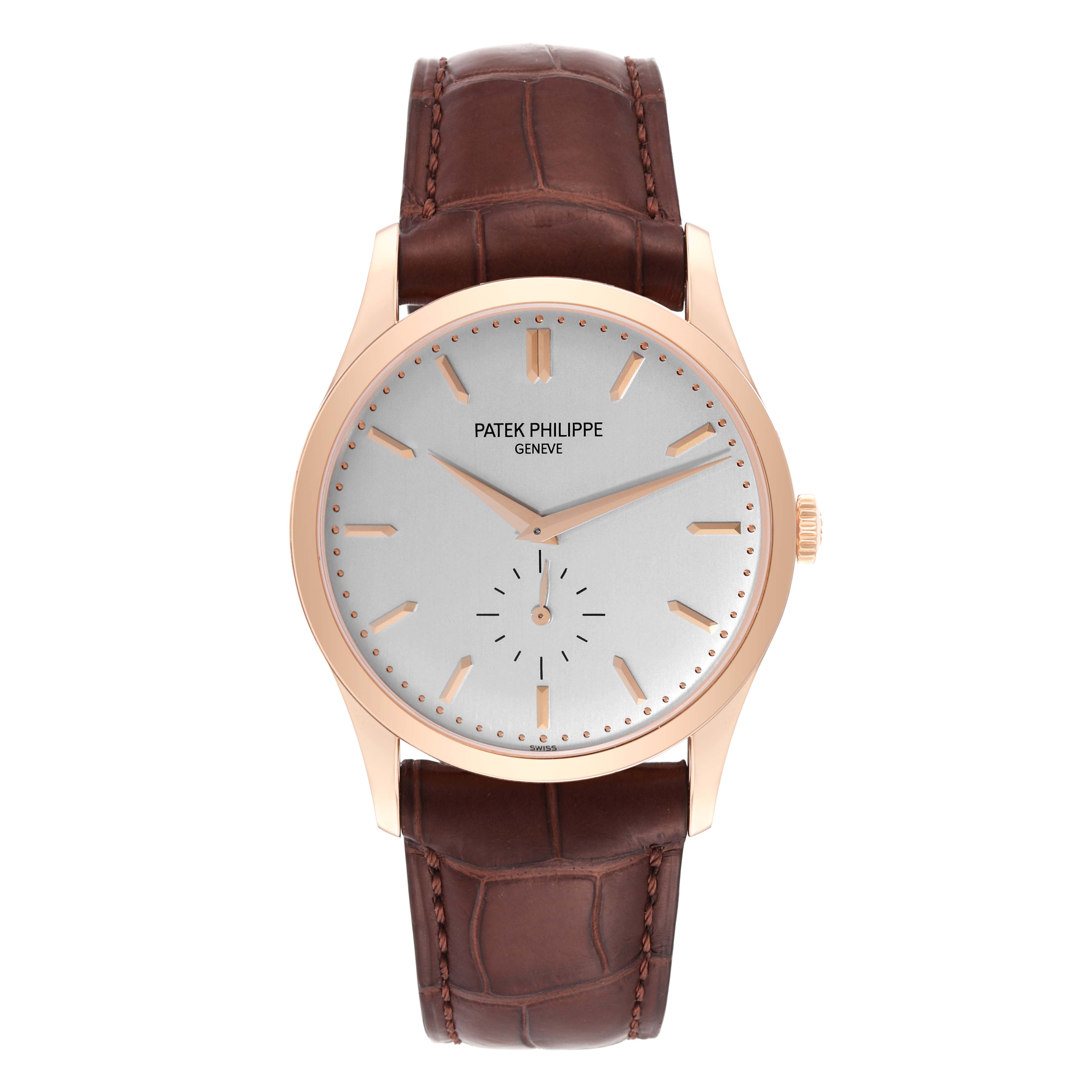The image shows a front view of a Patek Philippe Calatrava 5196R Men
s Rose Gold Silver Dial 5196R Men
s Rose Gold Silver Dial watch with a leather strap.