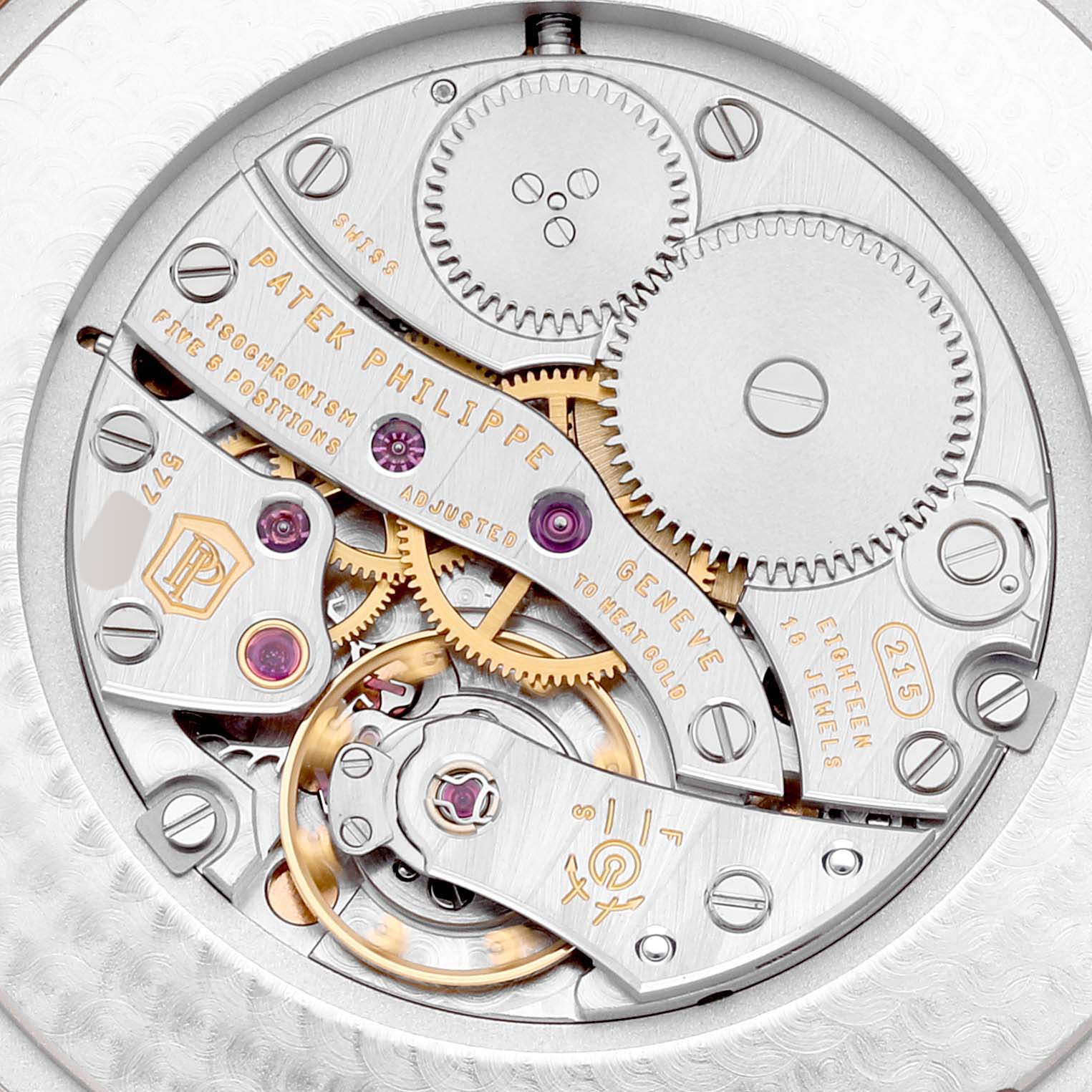 This image shows the back view of a Patek Philippe Calatrava 5196R Men
s Rose Gold Silver Dial 5196R Men
s Rose Gold Silver Dial, highlighting its intricate movement and internal components.