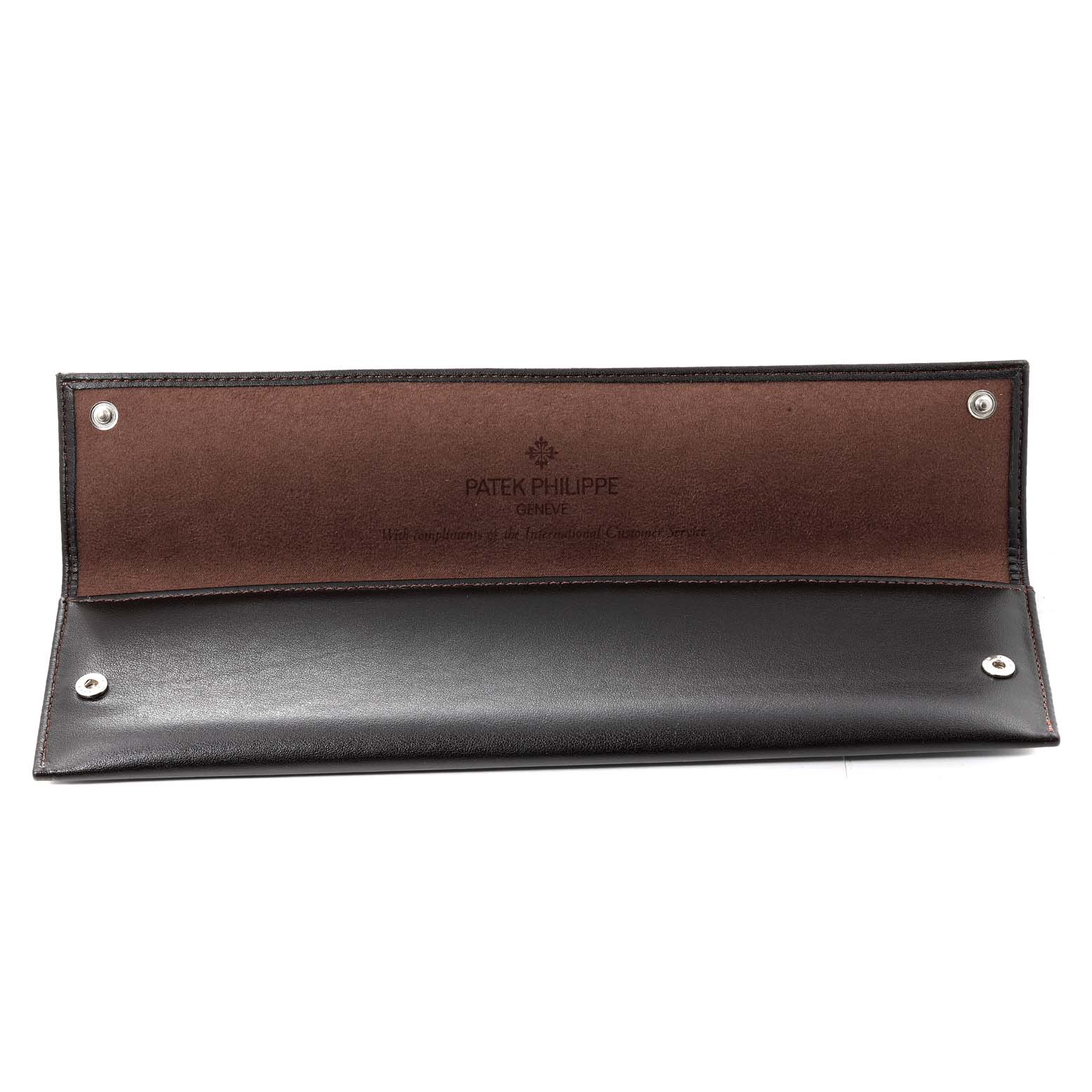 Shown is a Patek Philippe Calatrava 5119R Men's Rose Gold White Dial 5119R Men's Rose Gold White Dial watch case, open flat, displaying its inside lining and snap closures.