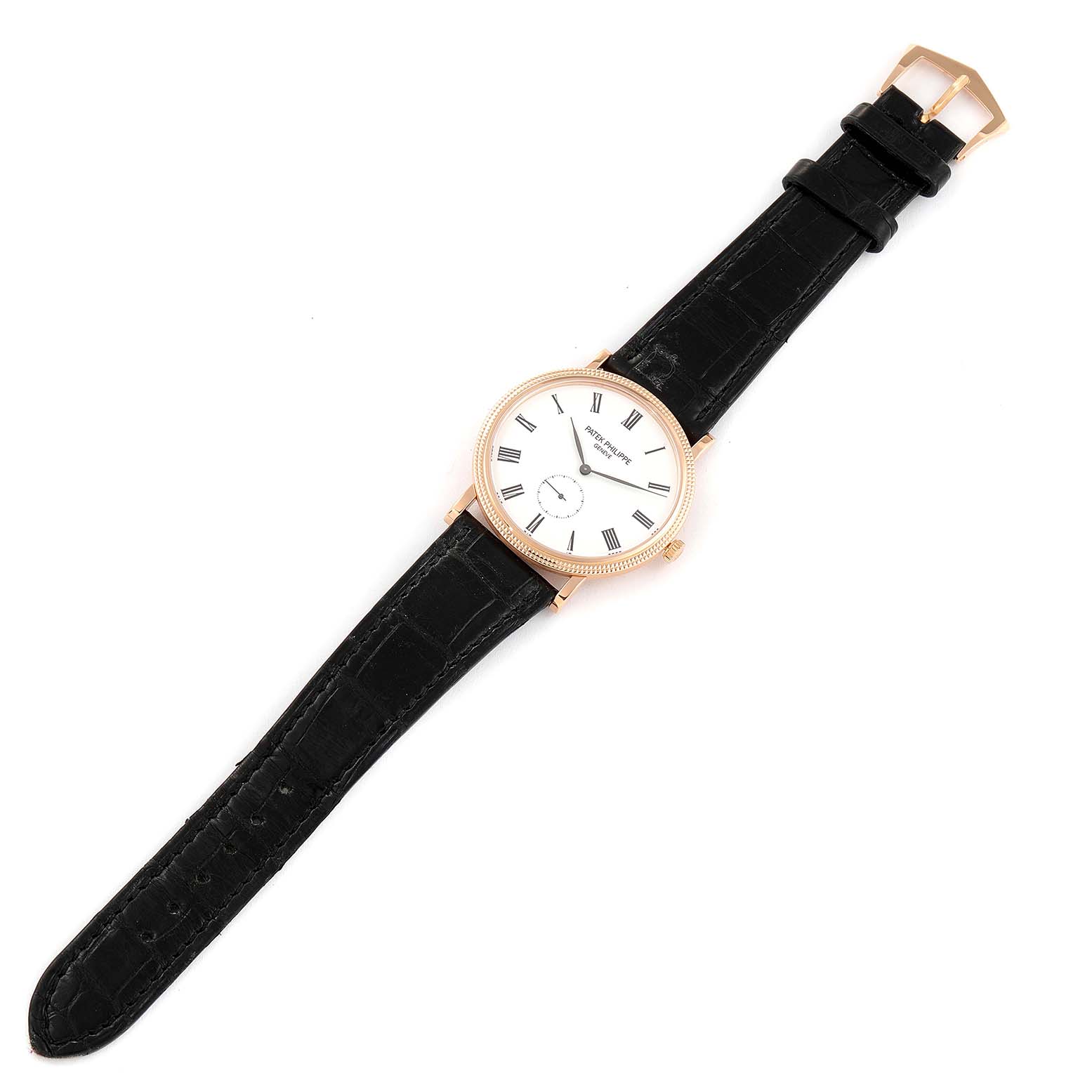 The image shows a top view of a Patek Philippe Calatrava 5119R Men's Rose Gold White Dial 5119R Men's Rose Gold White Dial watch with a black leather strap and a white dial.