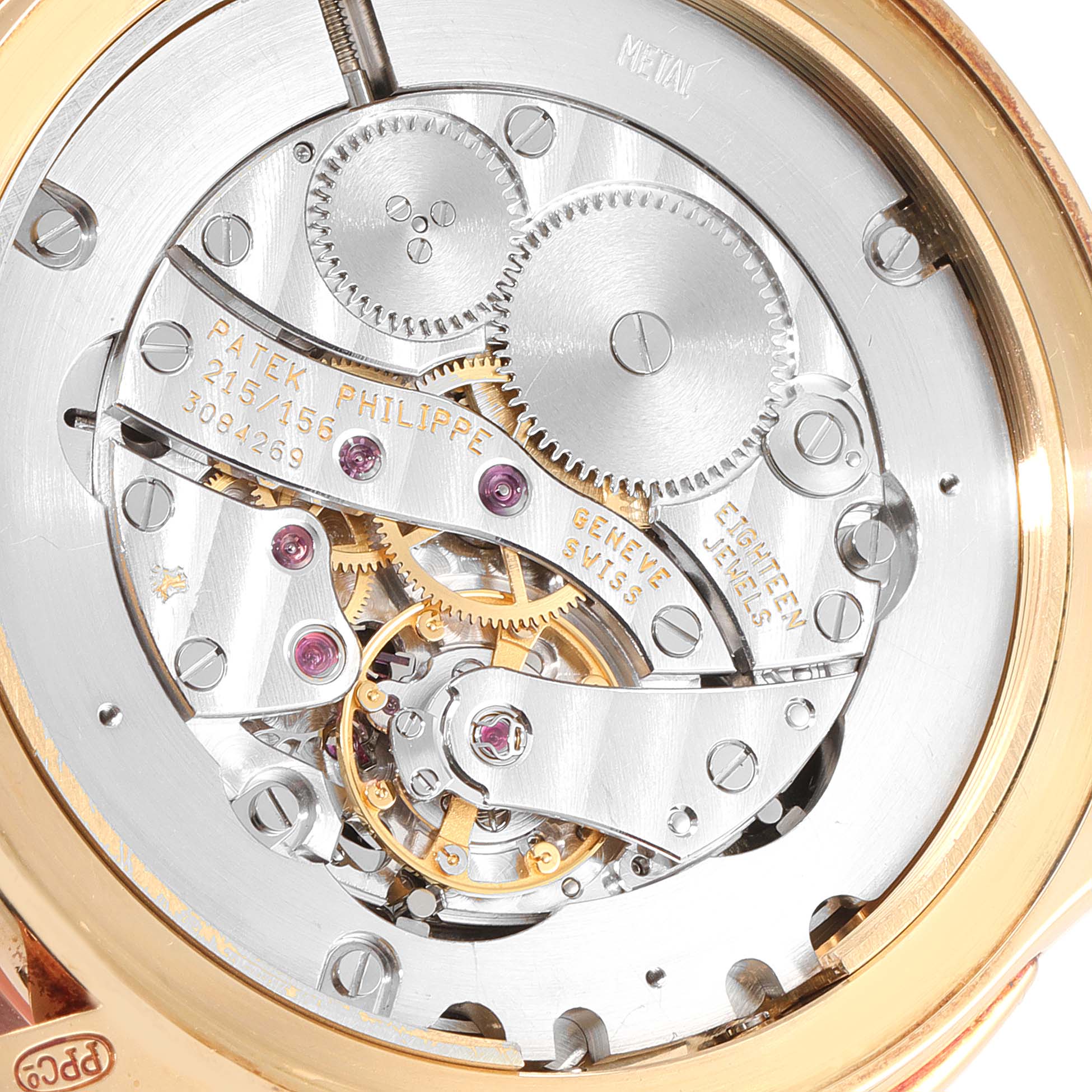 The image shows the detailed movement mechanism of a Patek Philippe Calatrava 5134J Men's Yellow Gold White Dial 5134J Men's Yellow Gold White Dial watch from a top-down angle.