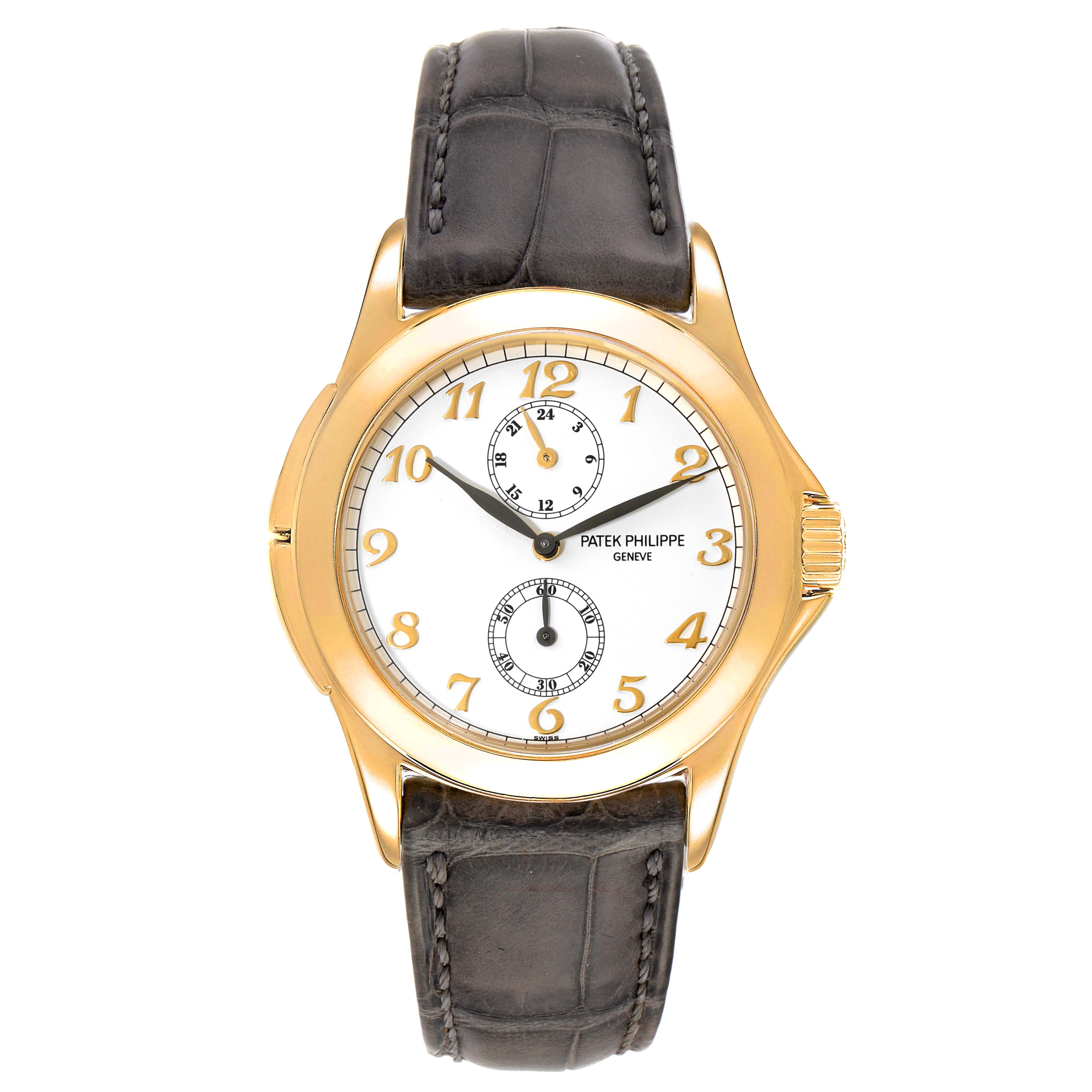 This image shows a full frontal view of the Patek Philippe Calatrava 5134J Men's Yellow Gold White Dial 5134J Men's Yellow Gold White Dial watch, highlighting its dial, case, and strap.