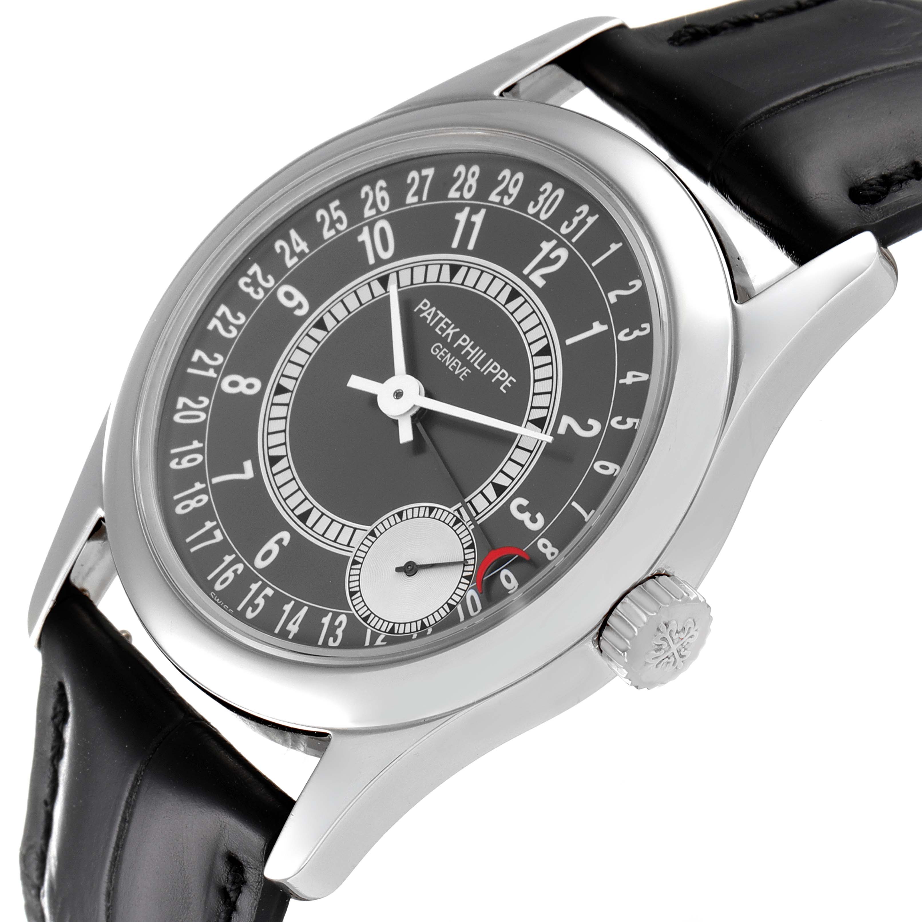 The image shows a front-angle view of the Patek Philippe Calatrava 6000G Men
s White Gold Grey Dial 6000G Men
s White Gold Grey Dial watch, highlighting the dial, crown, and leather strap.