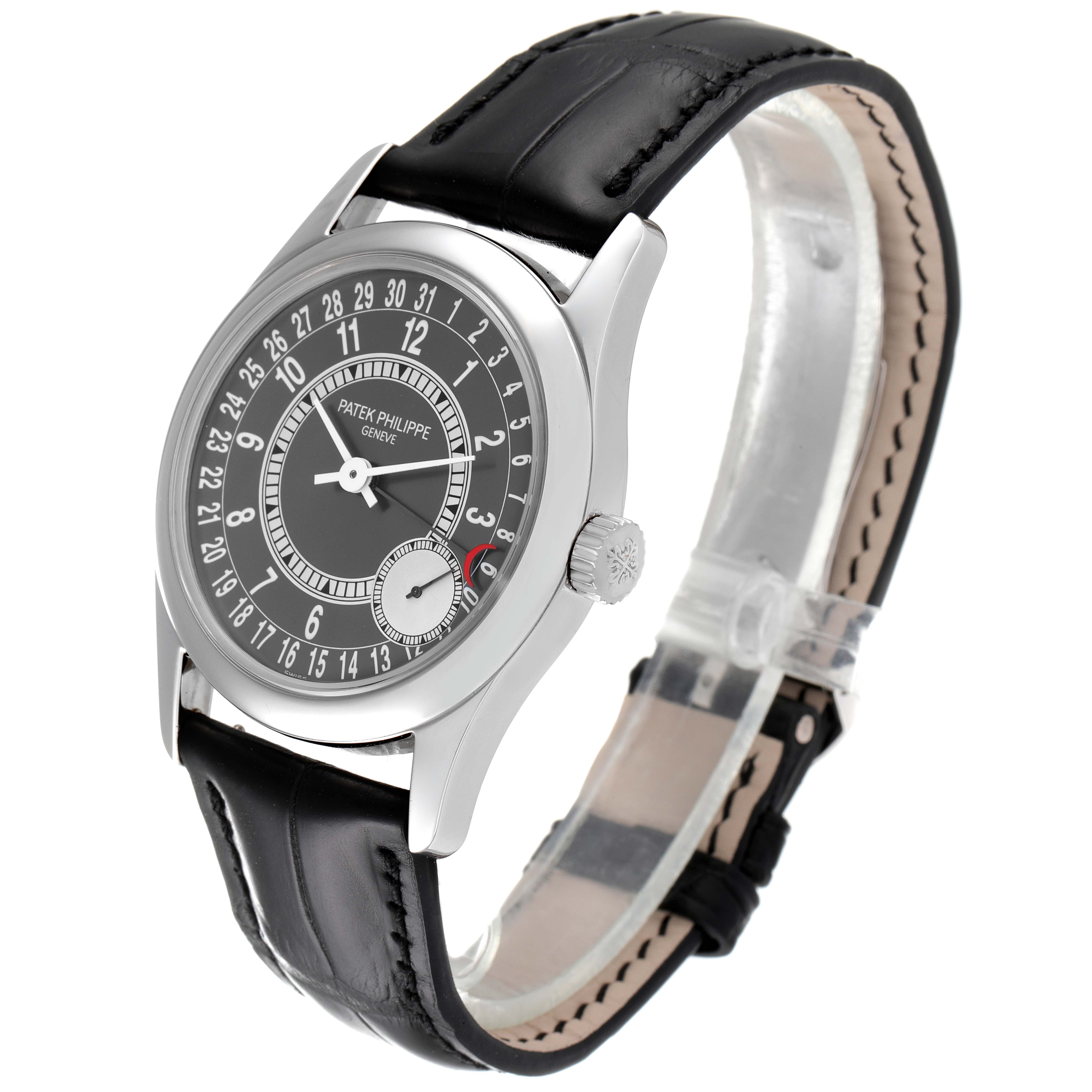 This image shows a Calatrava Patek Philippe watch from a three-quarter angle, displaying the face, bezel, crown, and leather strap.