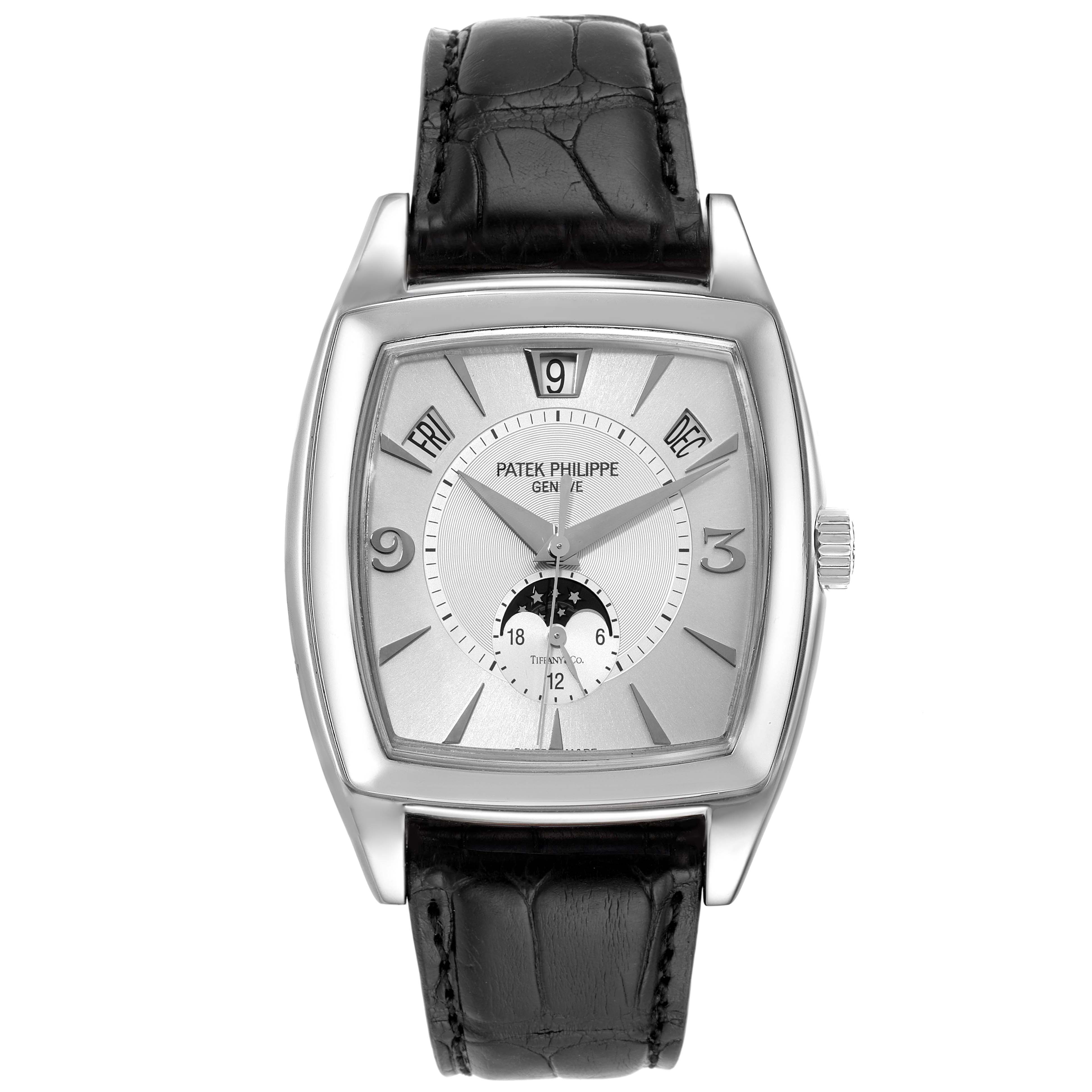 The image shows a front view of a Patek Philippe Gondolo 5135G Men's White Gold Silver Dial 5135G Men's White Gold Silver Dial watch, highlighting its black leather strap and silver rectangular dial.