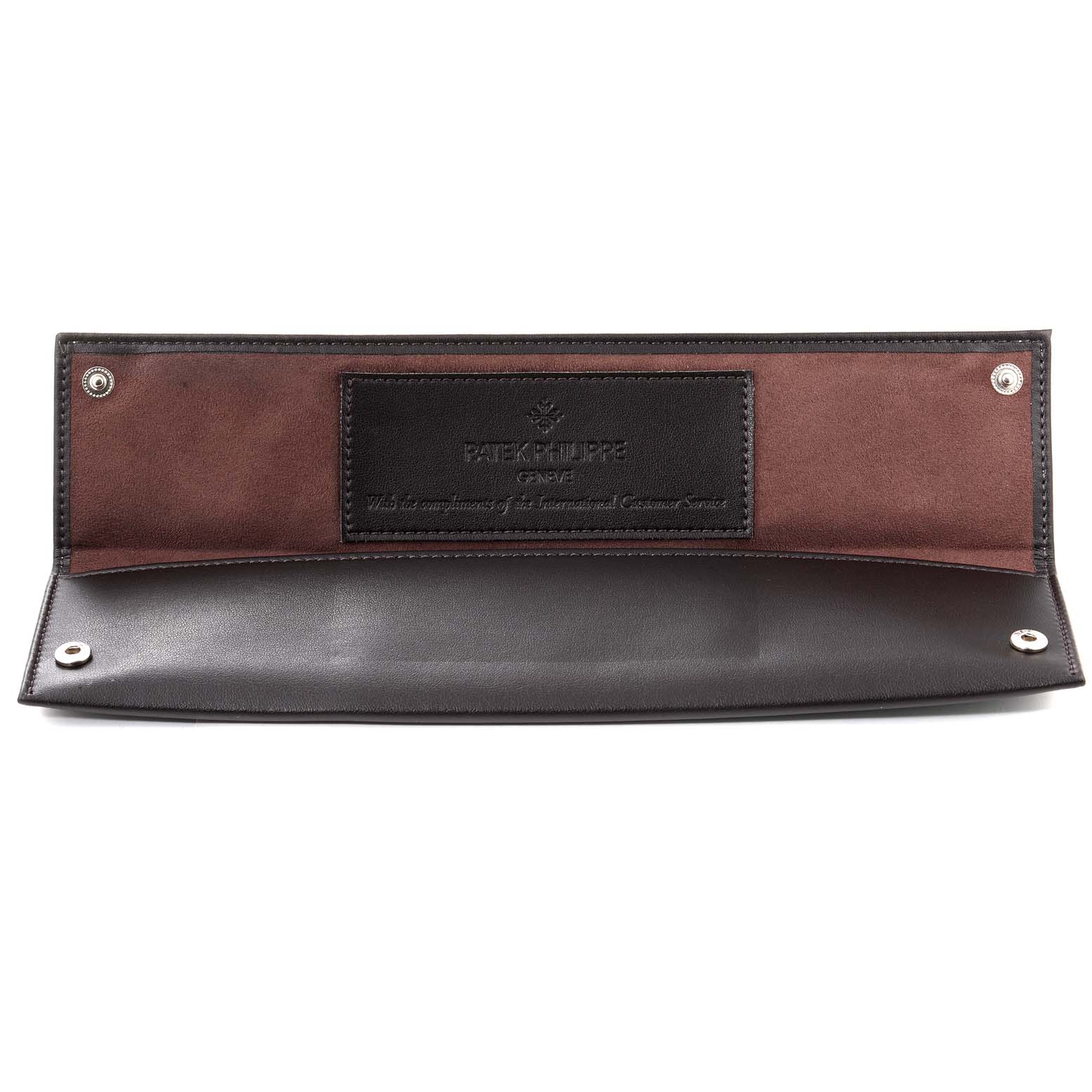 The image shows an open brown and black leather pouch for a Patek Philippe Gondolo 5135G Men's White Gold Silver Dial 5135G Men's White Gold Silver Dial watch.