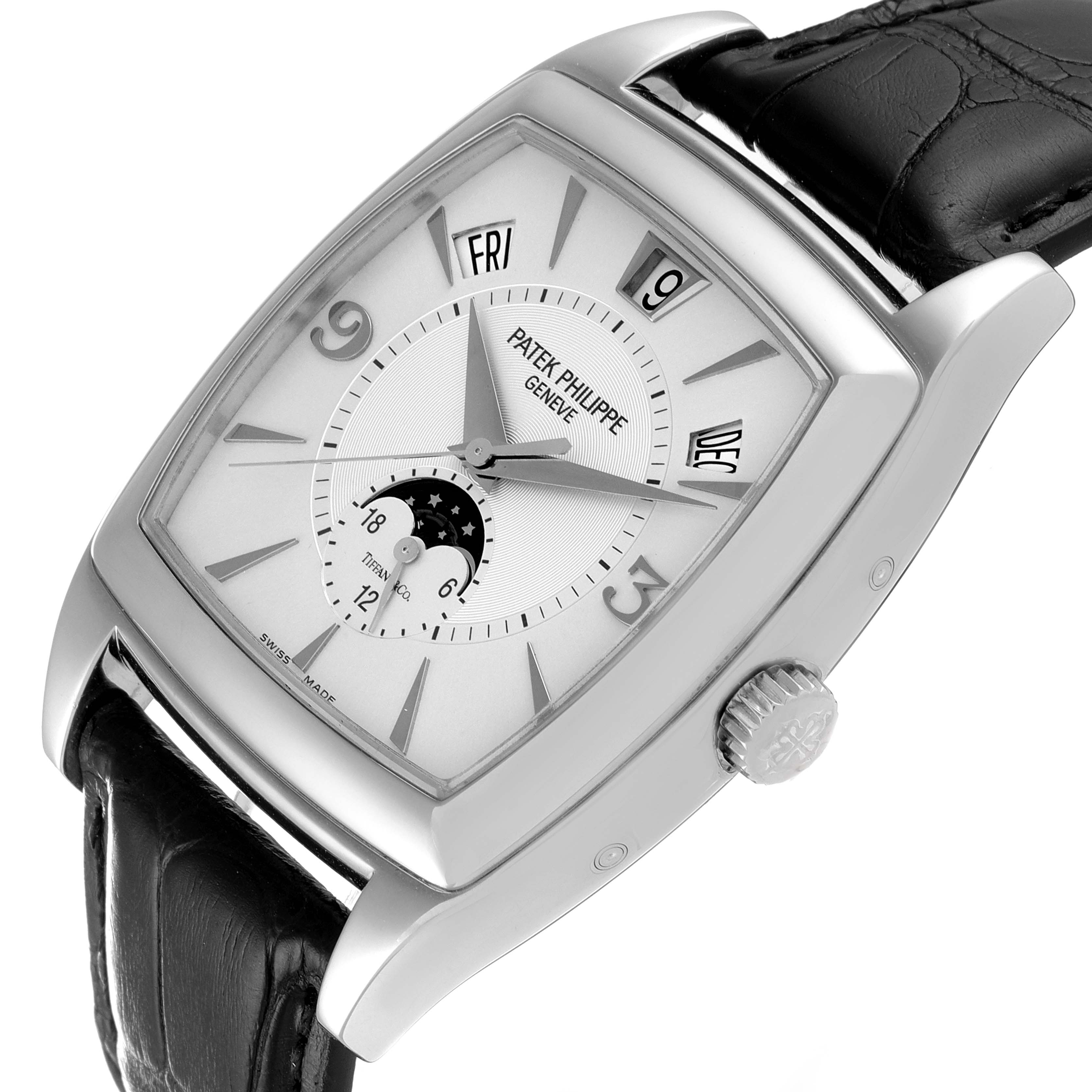 The image shows a close-up of the Patek Philippe Gondolo 5135G Men's White Gold Silver Dial 5135G Men's White Gold Silver Dial watch, highlighting the dial, crown, and leather strap.