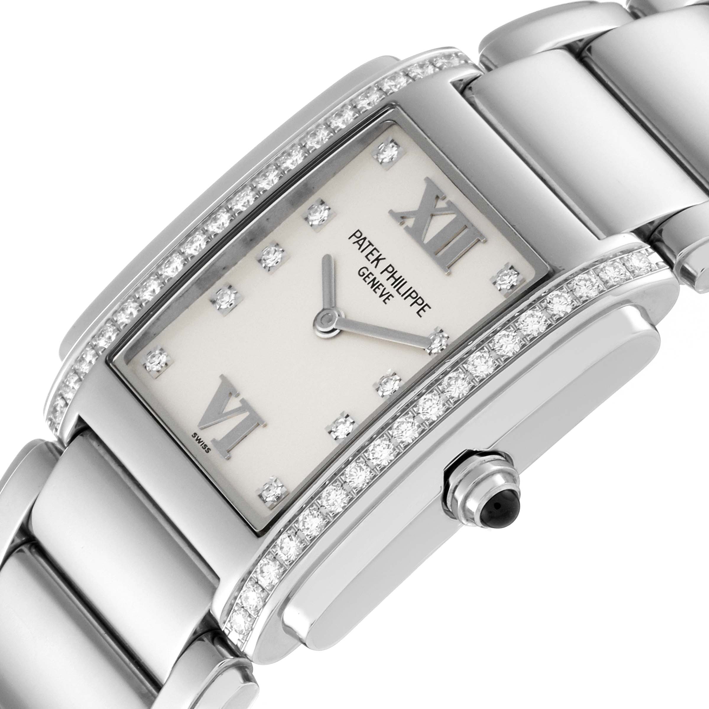 The image shows a close-up, angled view of the Patek Philippe Twenty-4 4910/010 Women's Stainless Steel Silver Dial 4910/010 Women's Stainless Steel Silver Dial watch, highlighting the face, bezel, and part of the bracelet.