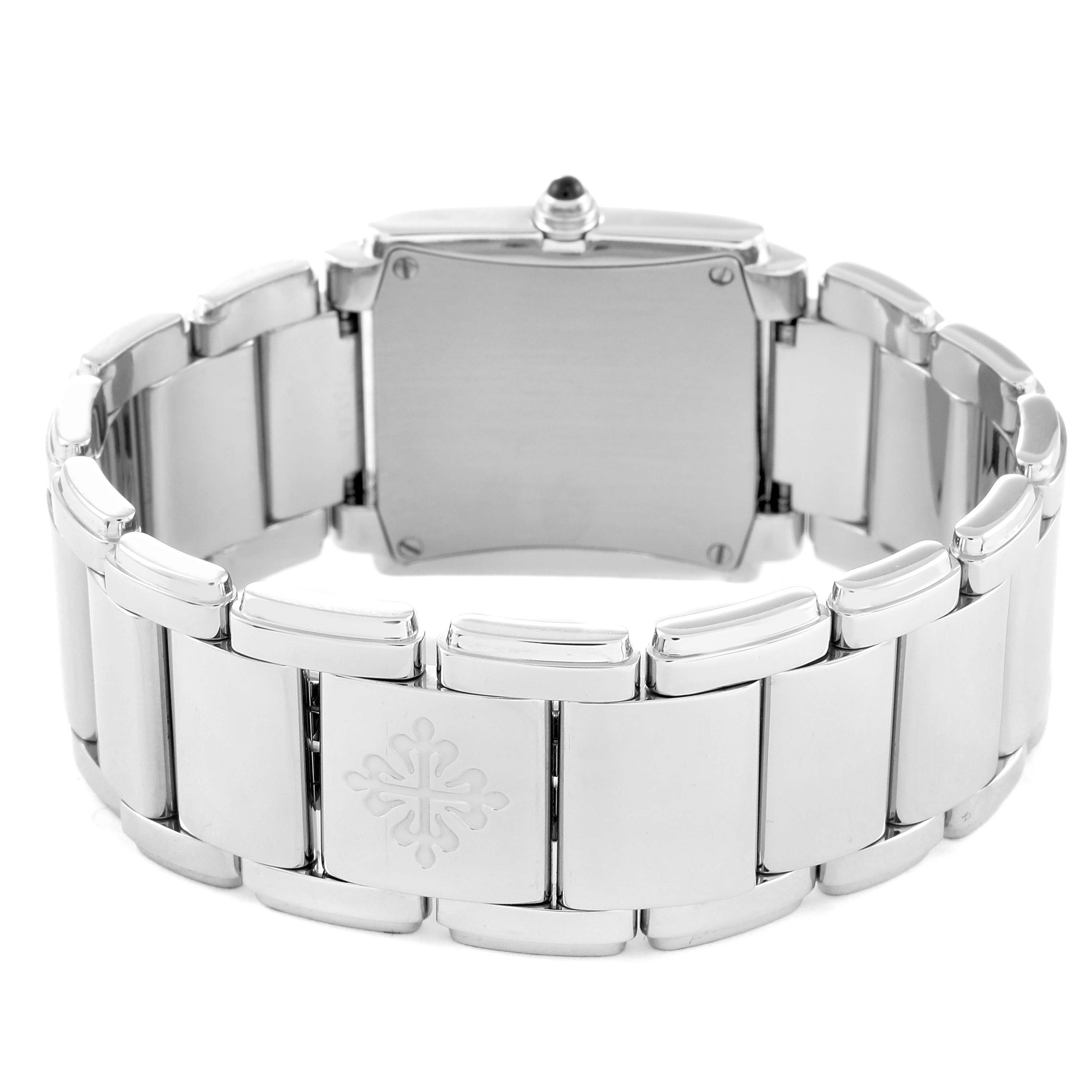 The image shows the back angle of the Patek Philippe Twenty-4 4910/010 Women's Stainless Steel Silver Dial 4910/010 Women's Stainless Steel Silver Dial watch, highlighting its bracelet and clasp.