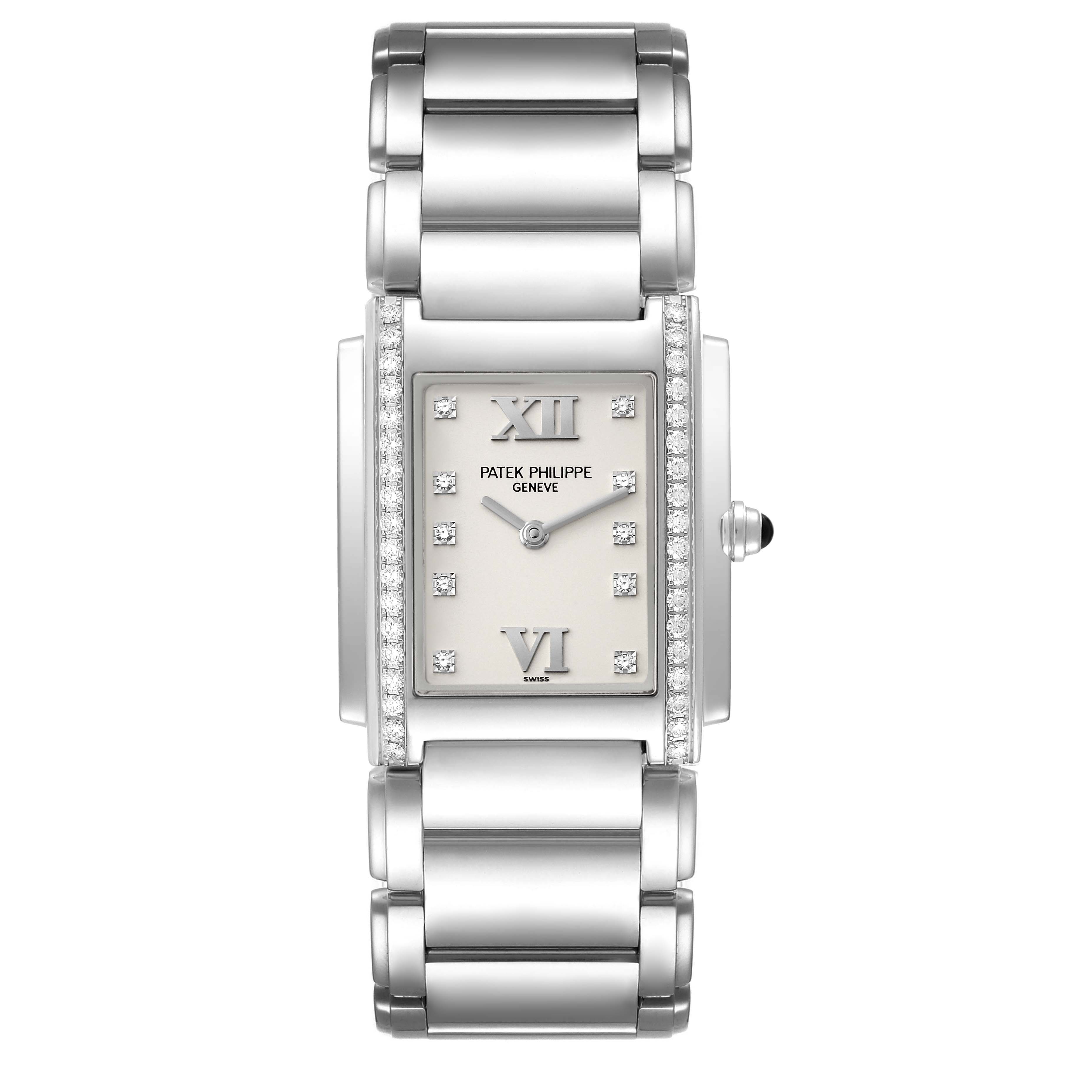 The image shows a front view of a Patek Philippe Twenty-4 4910/010 Women's Stainless Steel Silver Dial 4910/010 Women's Stainless Steel Silver Dial watch, highlighting its dial, diamond markers, and metal bracelet.