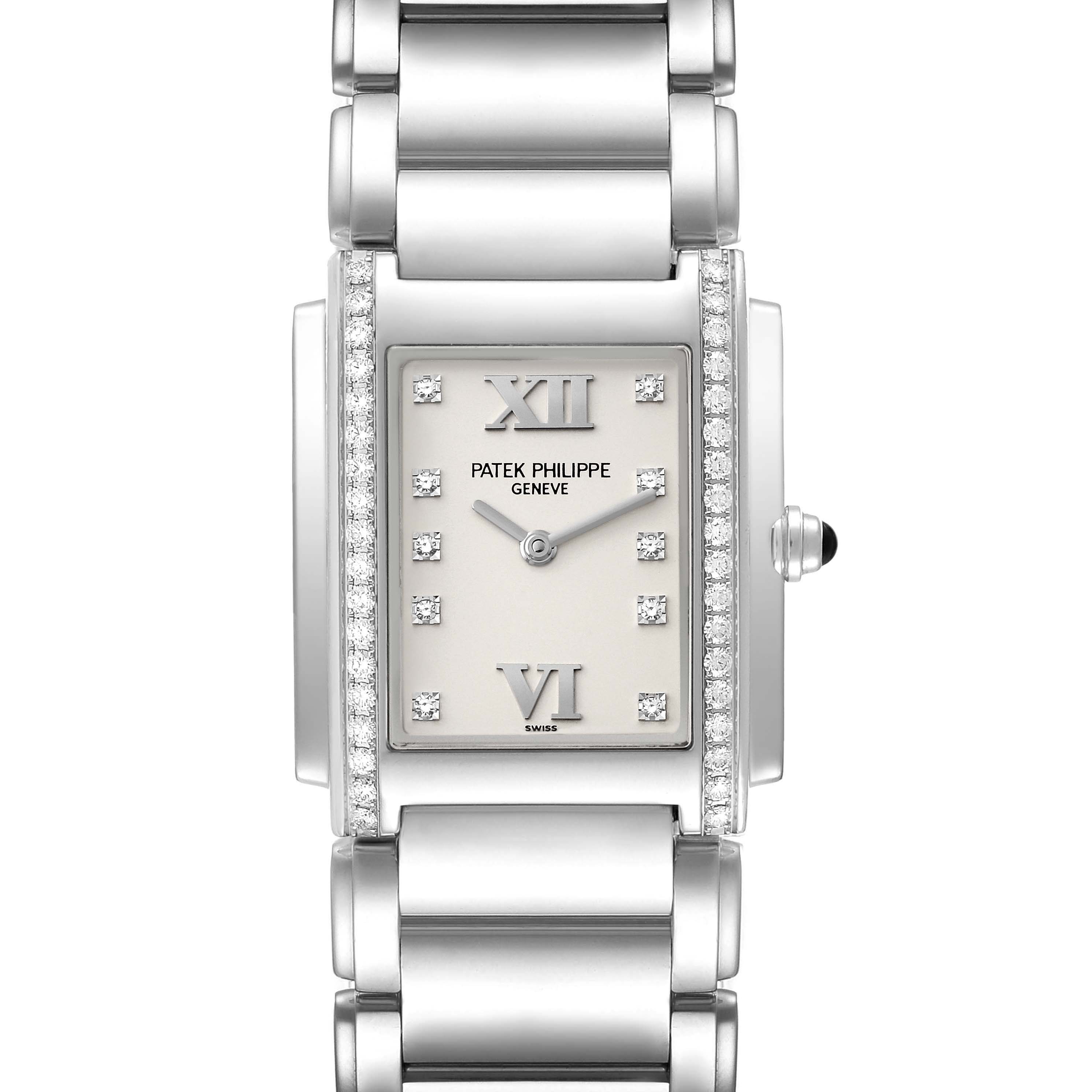 The image shows a front view of the Patek Philippe Twenty-4 4910/010 Women's Stainless Steel Silver Dial 4910/010 Women's Stainless Steel Silver Dial watch, showcasing the face, bracelet, and side crown.