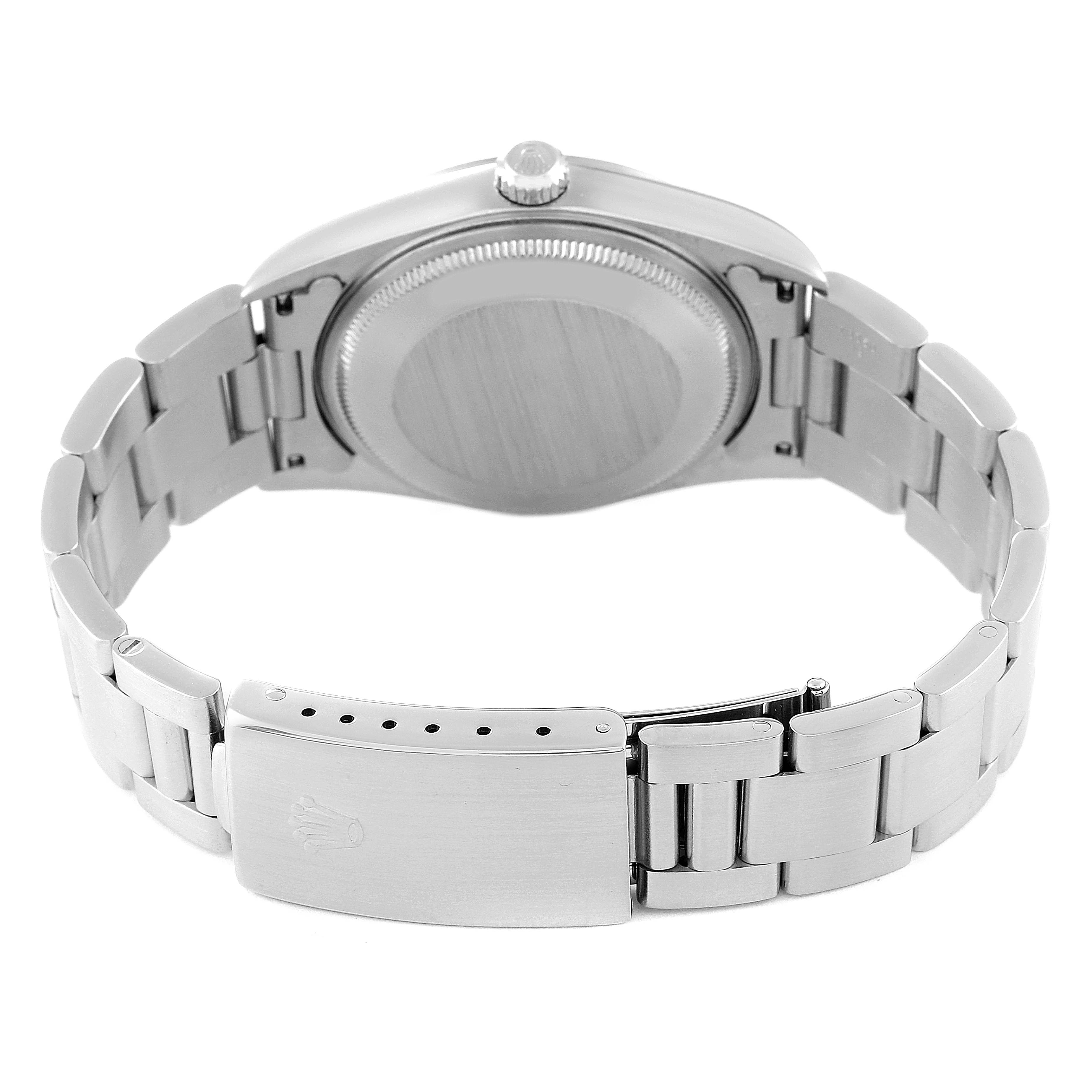 The image shows the back side of a Rolex Air-King 14000 Men's Stainless Steel Silver Dial 14000 Men's Stainless Steel Silver Dial watch, focusing on the case back and clasp of the bracelet.