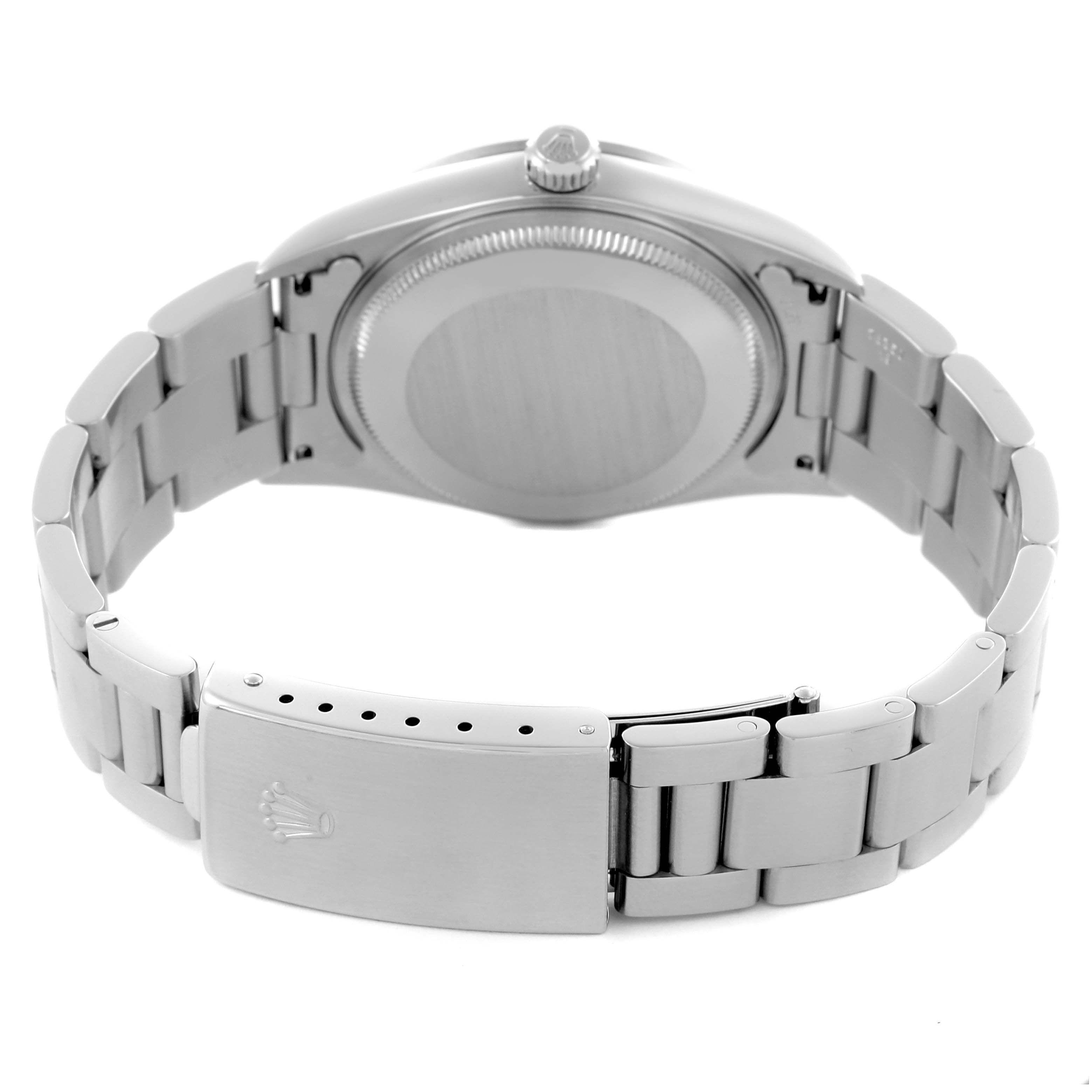 The Rolex Air-King 14000M Men's Stainless Steel White Dial 14000M Men's Stainless Steel White Dial watch is shown from the back, highlighting the case back, bracelet, and clasp.