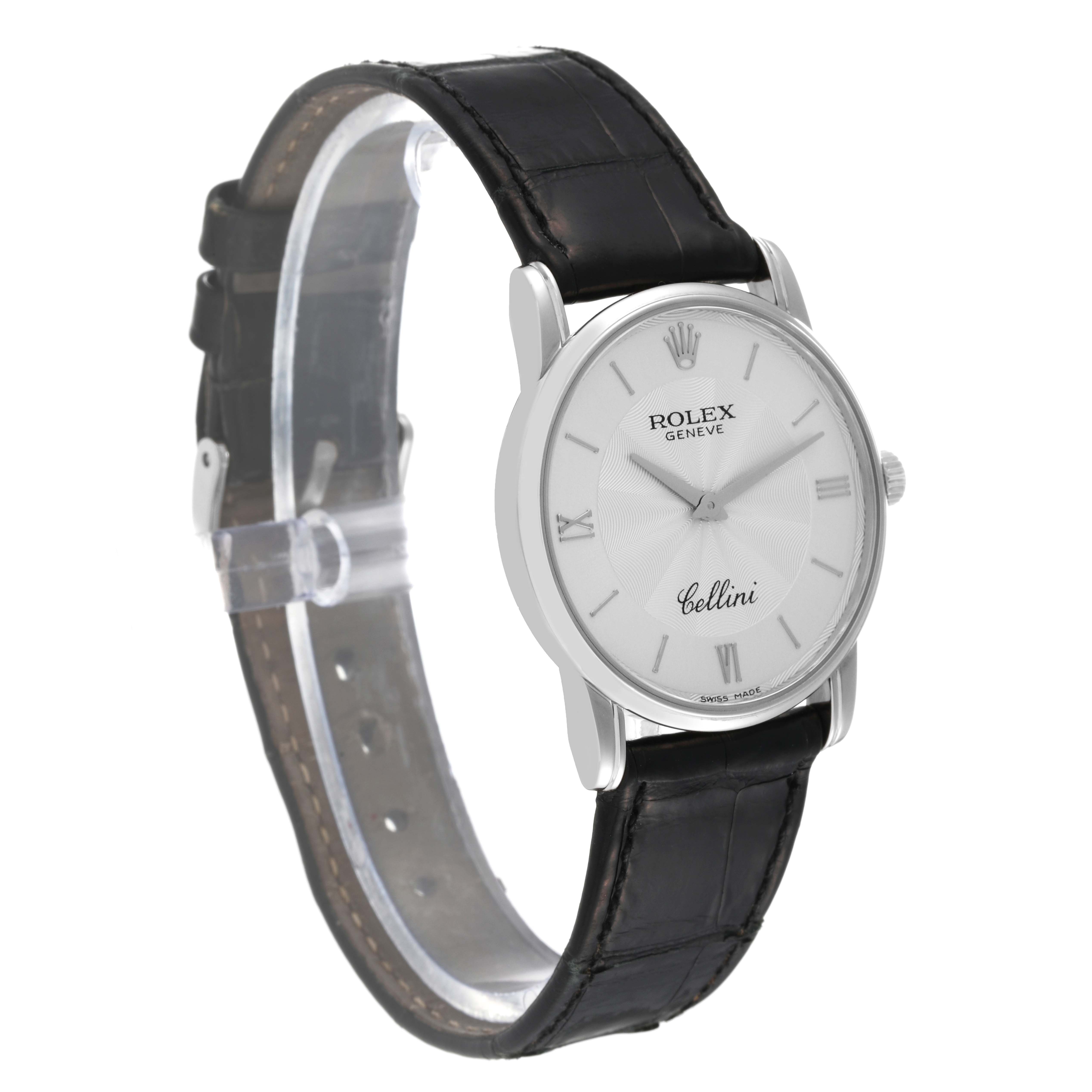 The Rolex Cellini 5116/9 Men
s White Gold Silver Dial 5116/9 Men
s White Gold Silver Dial watch is shown at a slight angle, displaying its dial, crown, and black leather strap.
