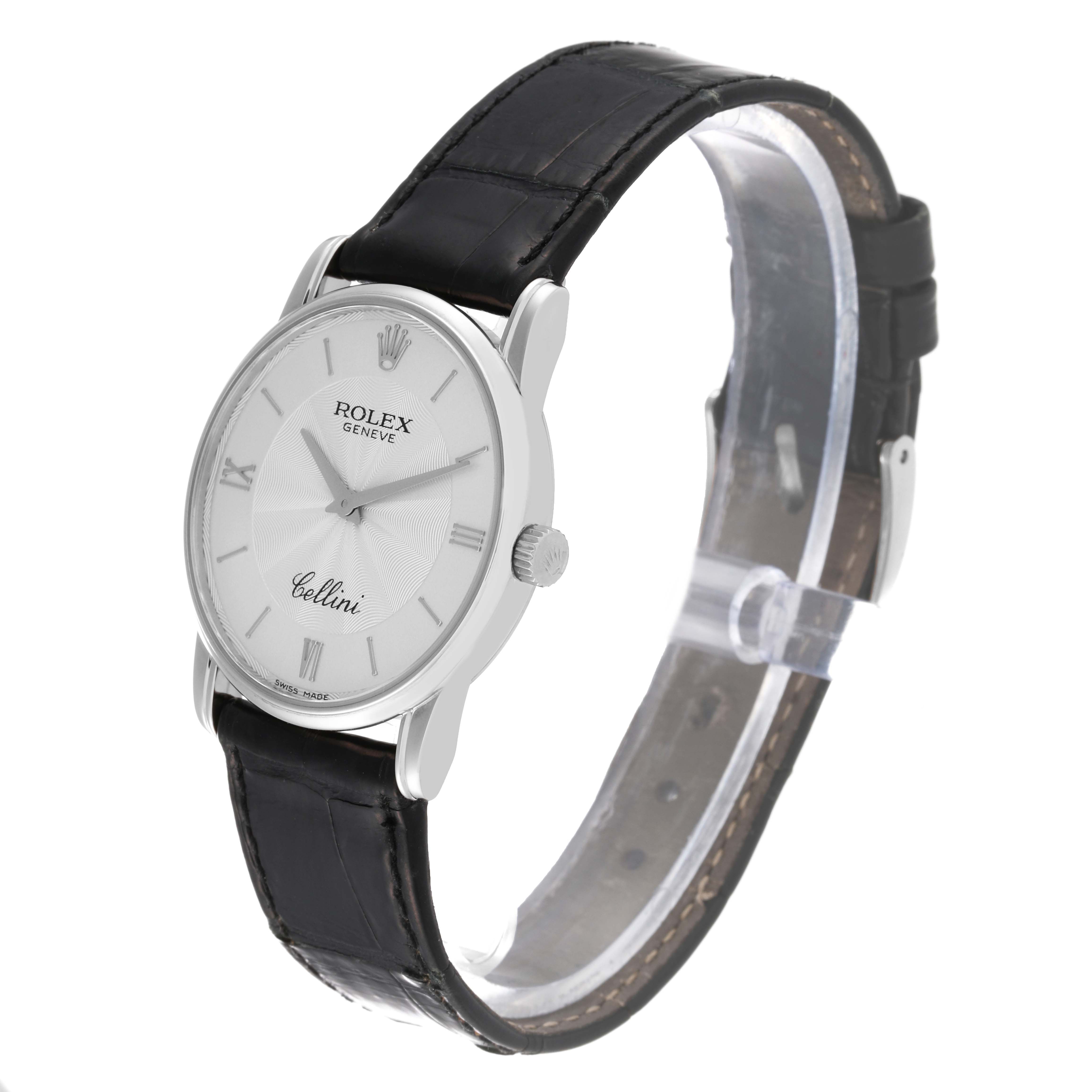 The image shows a side angle of a Rolex Cellini 5116/9 Men
s White Gold Silver Dial 5116/9 Men
s White Gold Silver Dial watch, highlighting the face, bezel, crown, and leather strap.