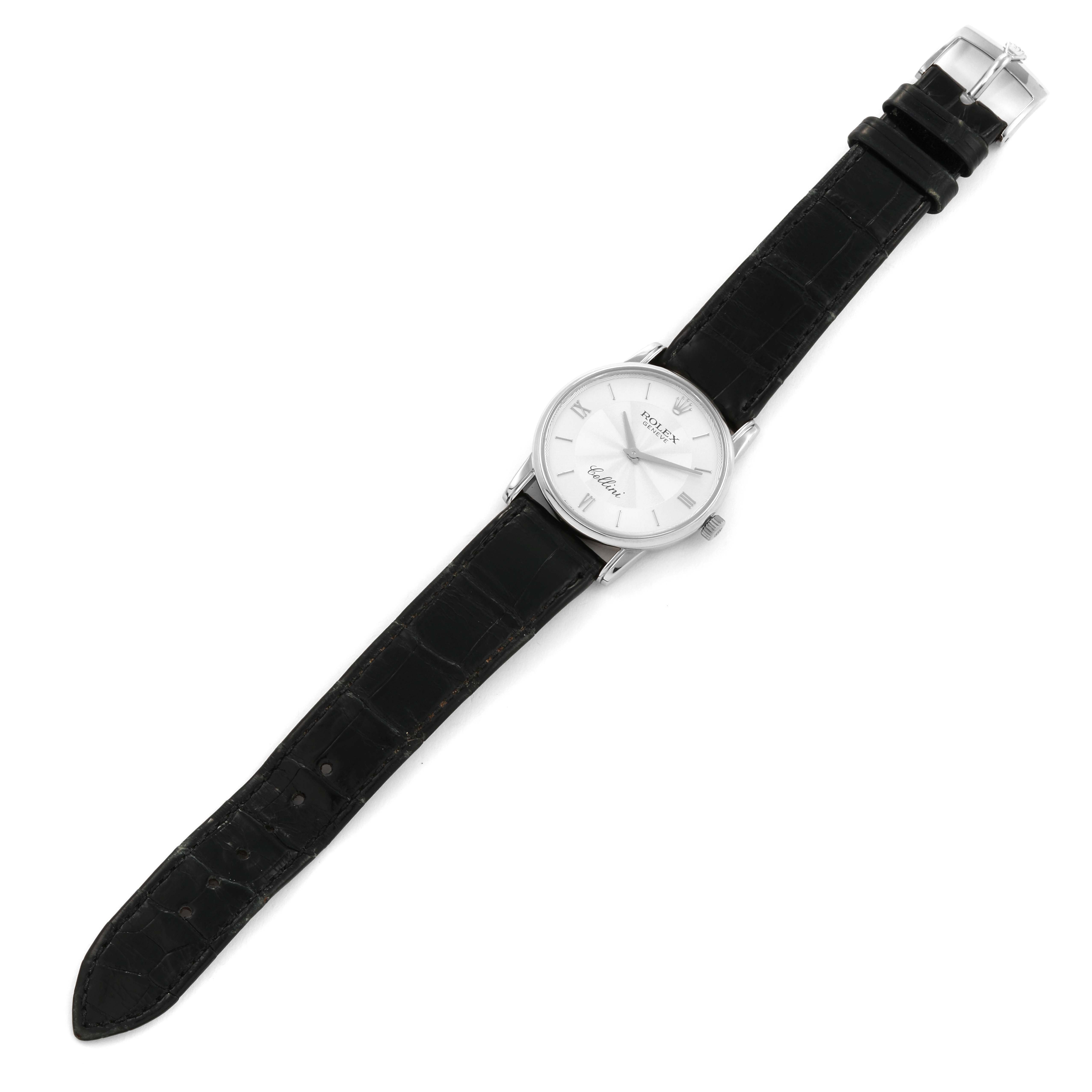 The Rolex Cellini 5116/9 Men
s White Gold Silver Dial 5116/9 Men
s White Gold Silver Dial watch is shown from an overhead angle, displaying the face, crown, and black leather strap.