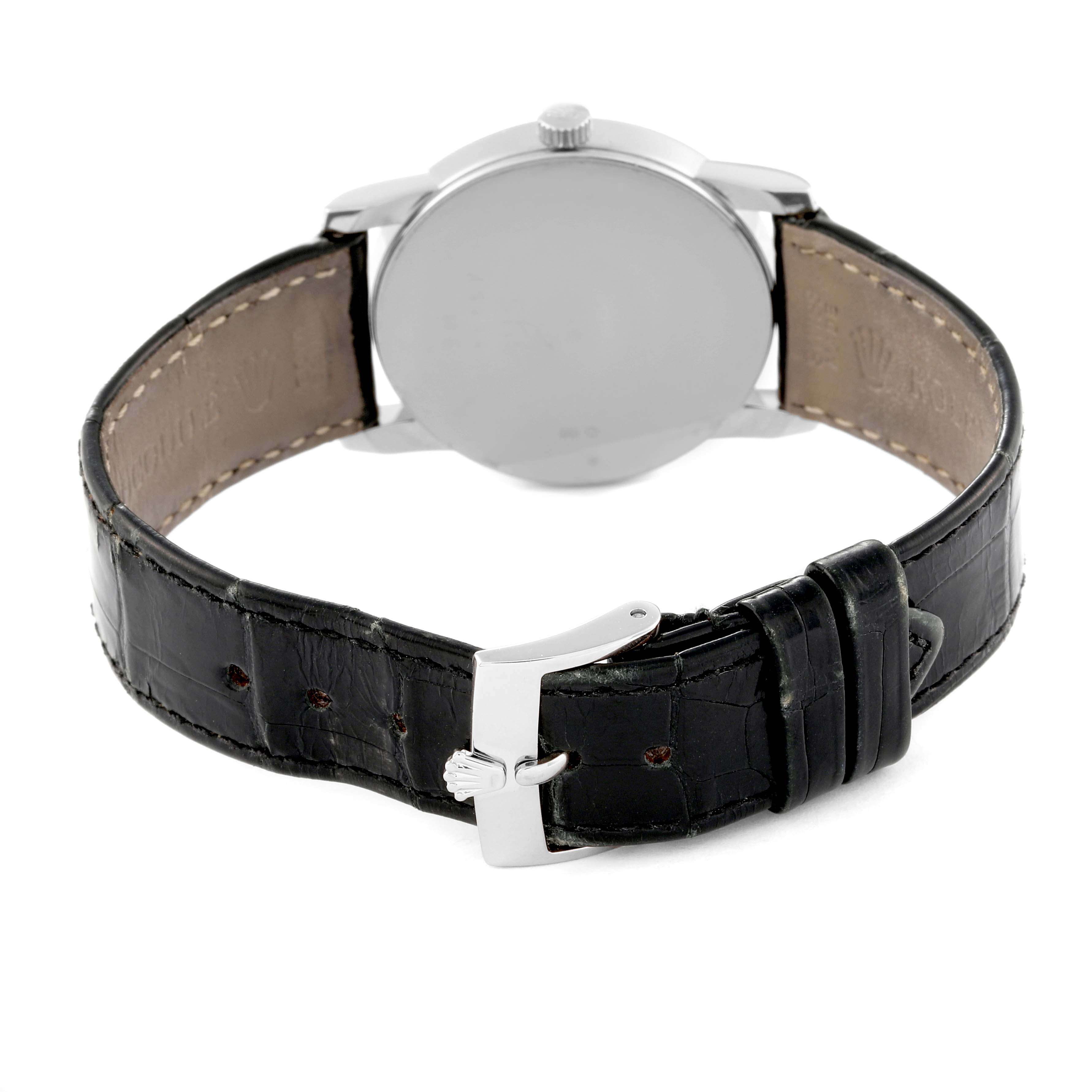 This image shows the back of a Rolex Cellini 5116/9 Men
s White Gold Silver Dial 5116/9 Men
s White Gold Silver Dial watch, focusing on the case, crown, and black leather strap.