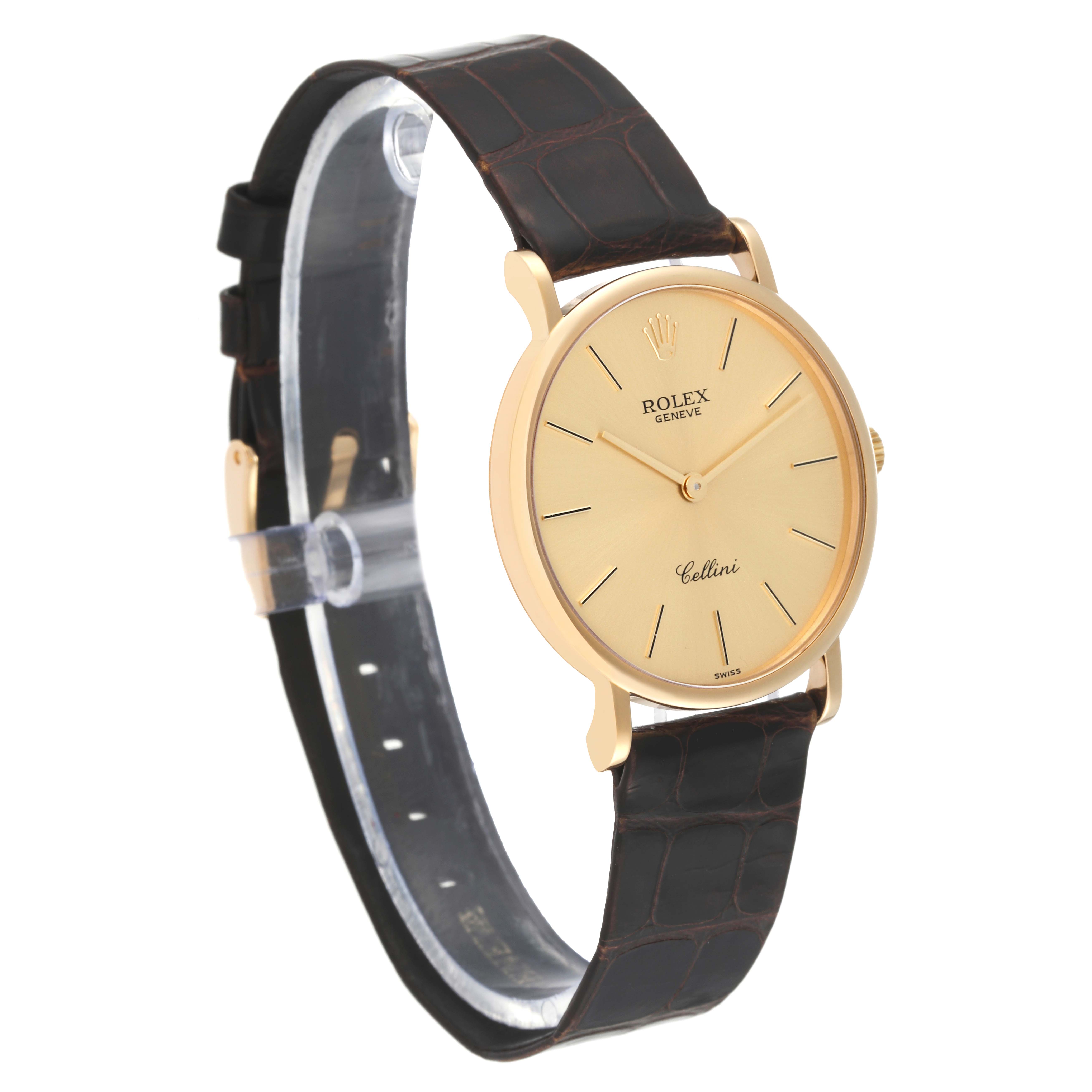 The Rolex Cellini 5112/8 Men's Yellow Gold Champagne Dial 5112/8 Men's Yellow Gold Champagne Dial watch is displayed at a three-quarter angle, highlighting its gold case, beige dial, and black leather strap.