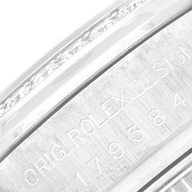 This close-up image of the Rolex Datejust 179384 Women's Stainless Steel Silver Dial 179384 Women's Stainless Steel Silver Dial Model shows the engraved outer rim with the text "ORIG ROLEX DESIGN".