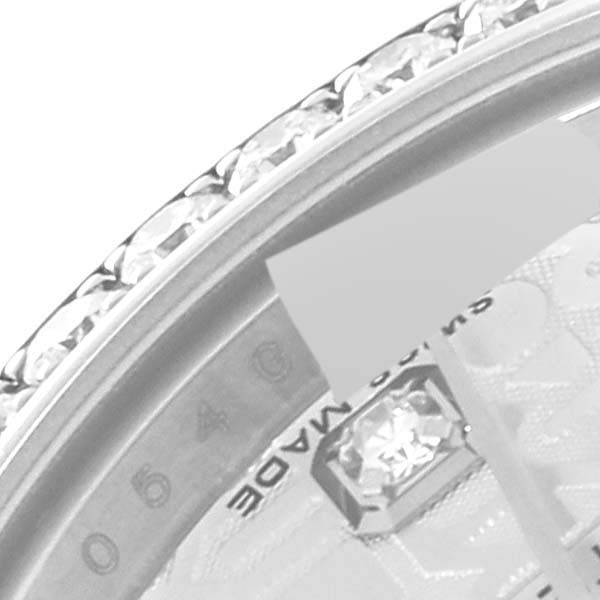 The image shows a close-up of the bezel and part of the dial of a Rolex Datejust 179384 Women's Stainless Steel Silver Dial 179384 Women's Stainless Steel Silver Dial watch.