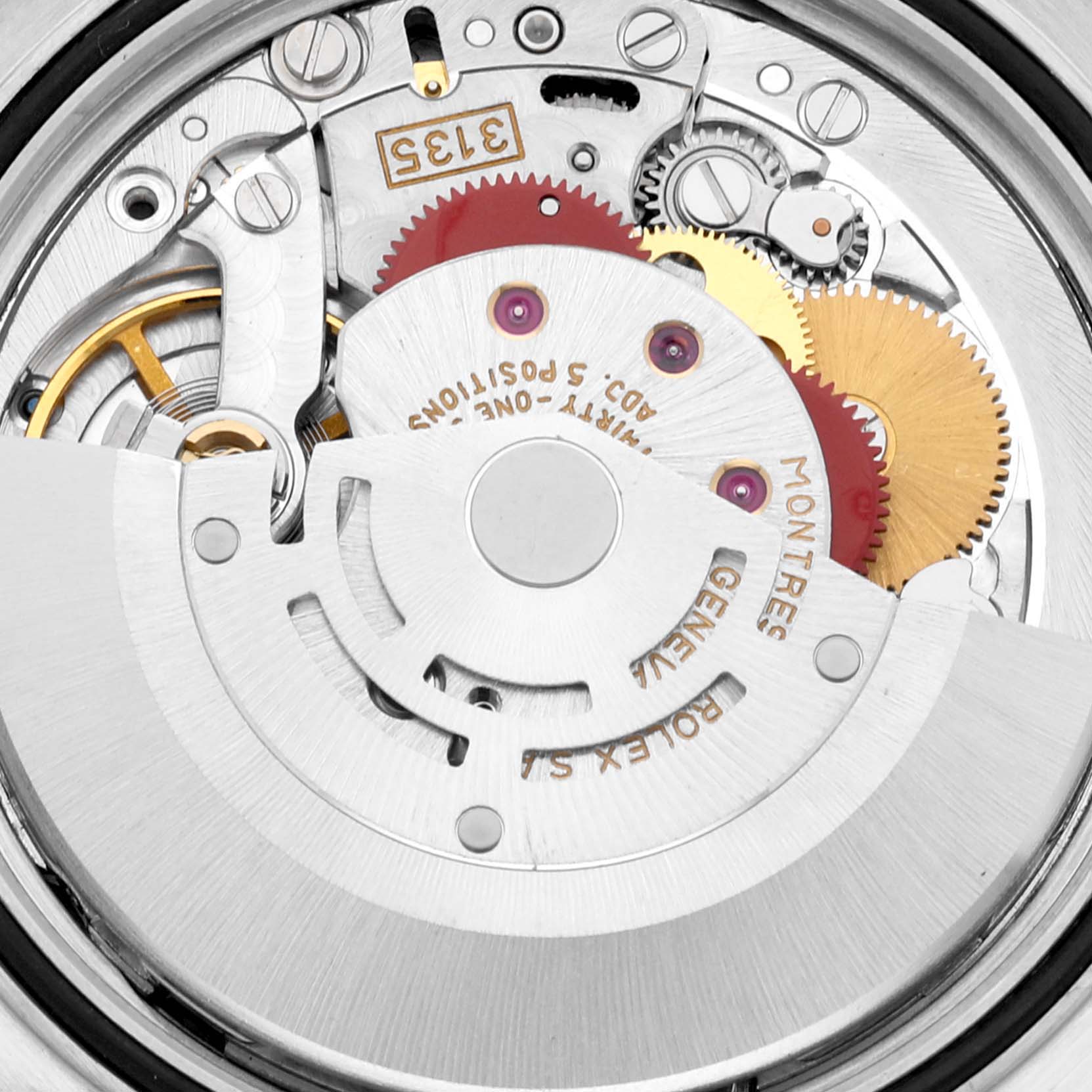 This image shows the movement mechanism of a Rolex Datejust 16233 Men's Steel and Gold (two tone) Champagne Dial 16233 Men's Steel and Gold (two tone) Champagne Dial watch, viewed from the back, revealing gears and internal components.