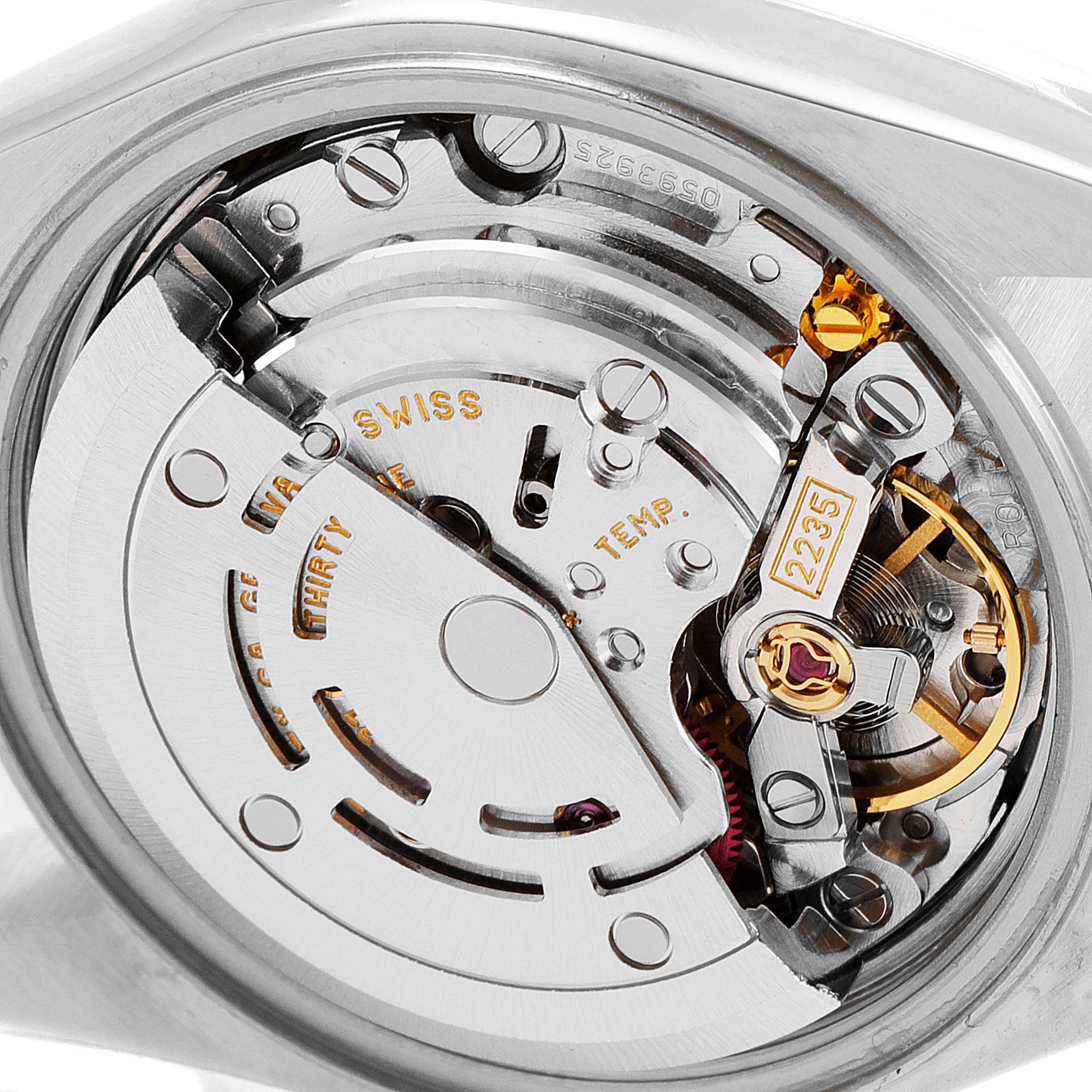 The angle shows the inner mechanism of the Rolex Datejust 79174 Women
s Stainless Steel White Dial 79174 Women
s Stainless Steel White Dial watch model, featuring its intricate movement components.