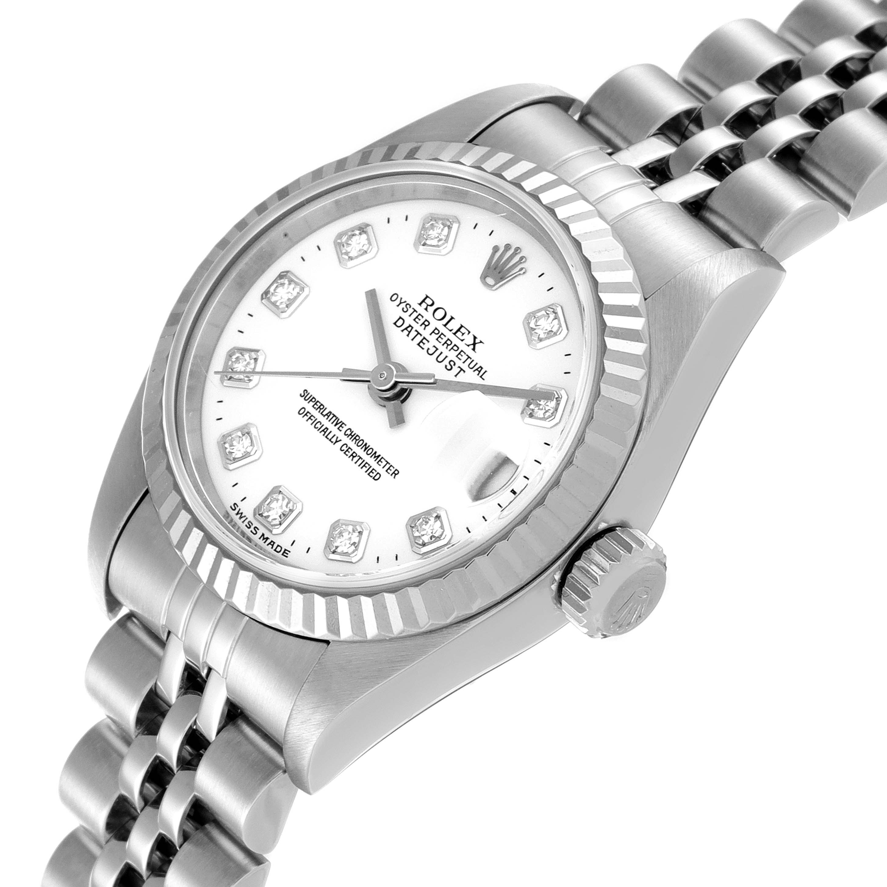 The image shows a side angle of a Rolex Datejust 79174 Women
s Stainless Steel White Dial 79174 Women
s Stainless Steel White Dial watch, highlighting its face, bezel, winder, and part of the bracelet.