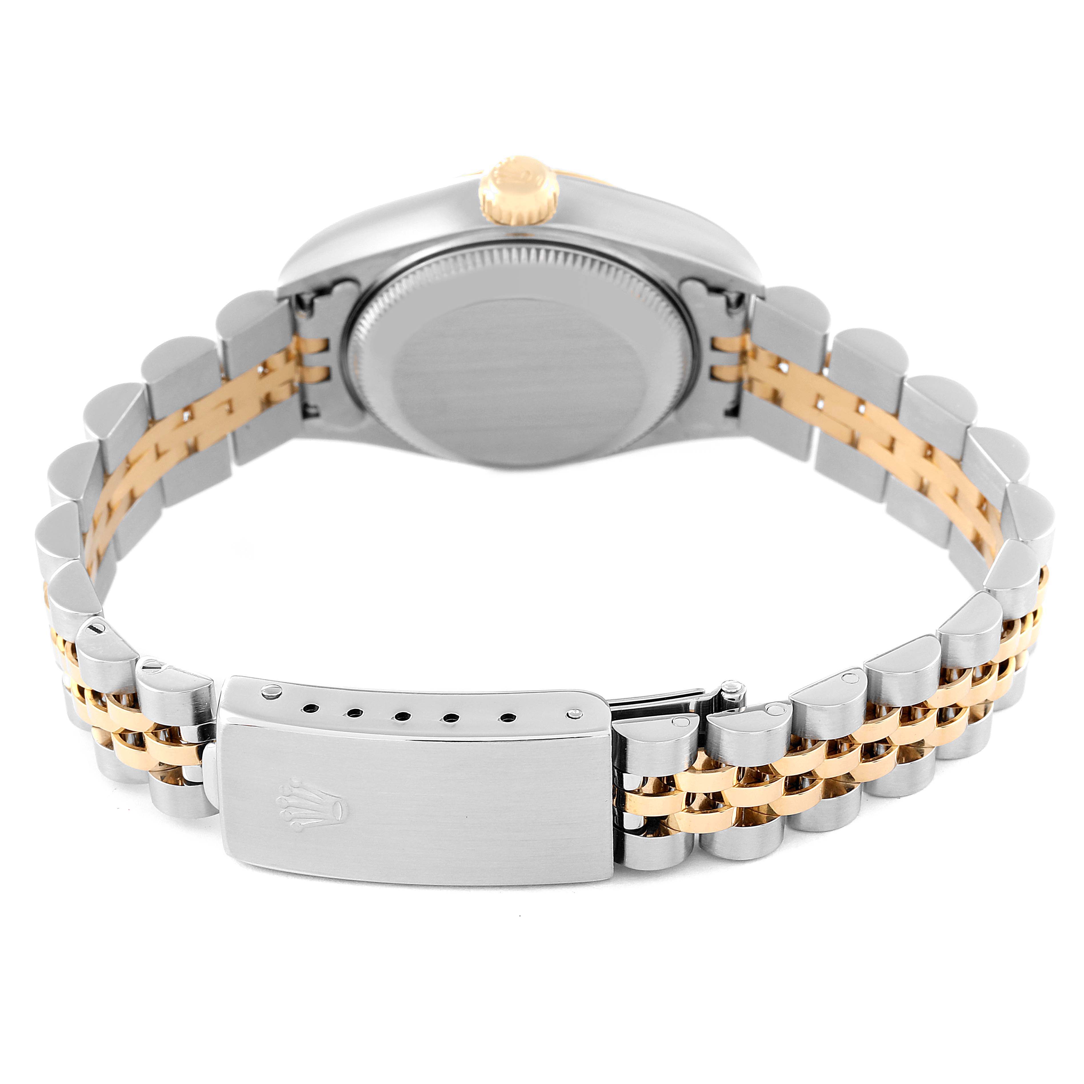 This image shows the back view of a Rolex Datejust 79173 Women's Steel and Gold (two tone) Champagne Dial 79173 Women's Steel and Gold (two tone) Champagne Dial watch, focusing on the case back, crown, and two-tone bracelet with a clasp.