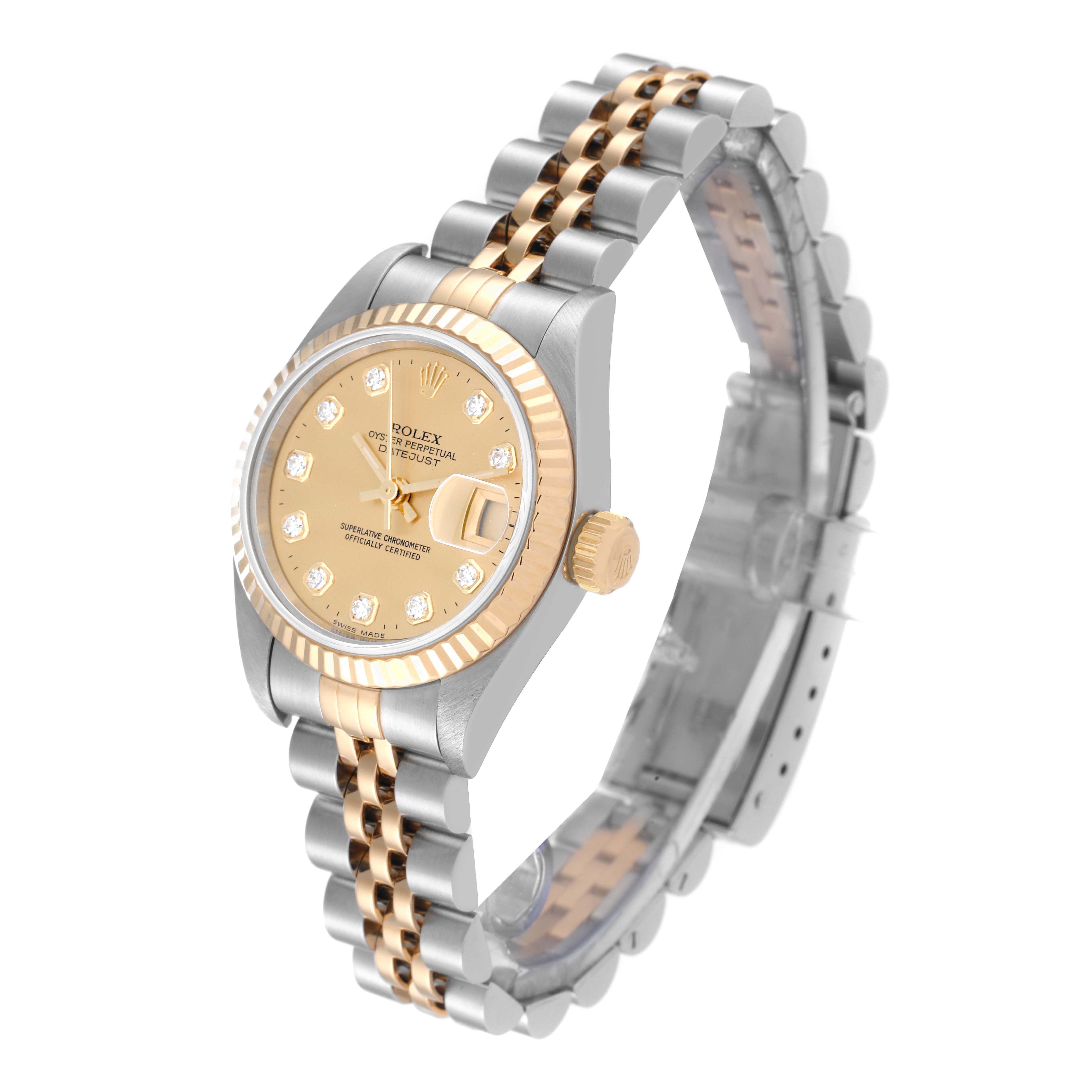 The image shows a Rolex Datejust 79173 Women's Steel and Gold (two tone) Champagne Dial 79173 Women's Steel and Gold (two tone) Champagne Dial watch from an angled side view, highlighting the dial, bezel, crown, and bracelet.