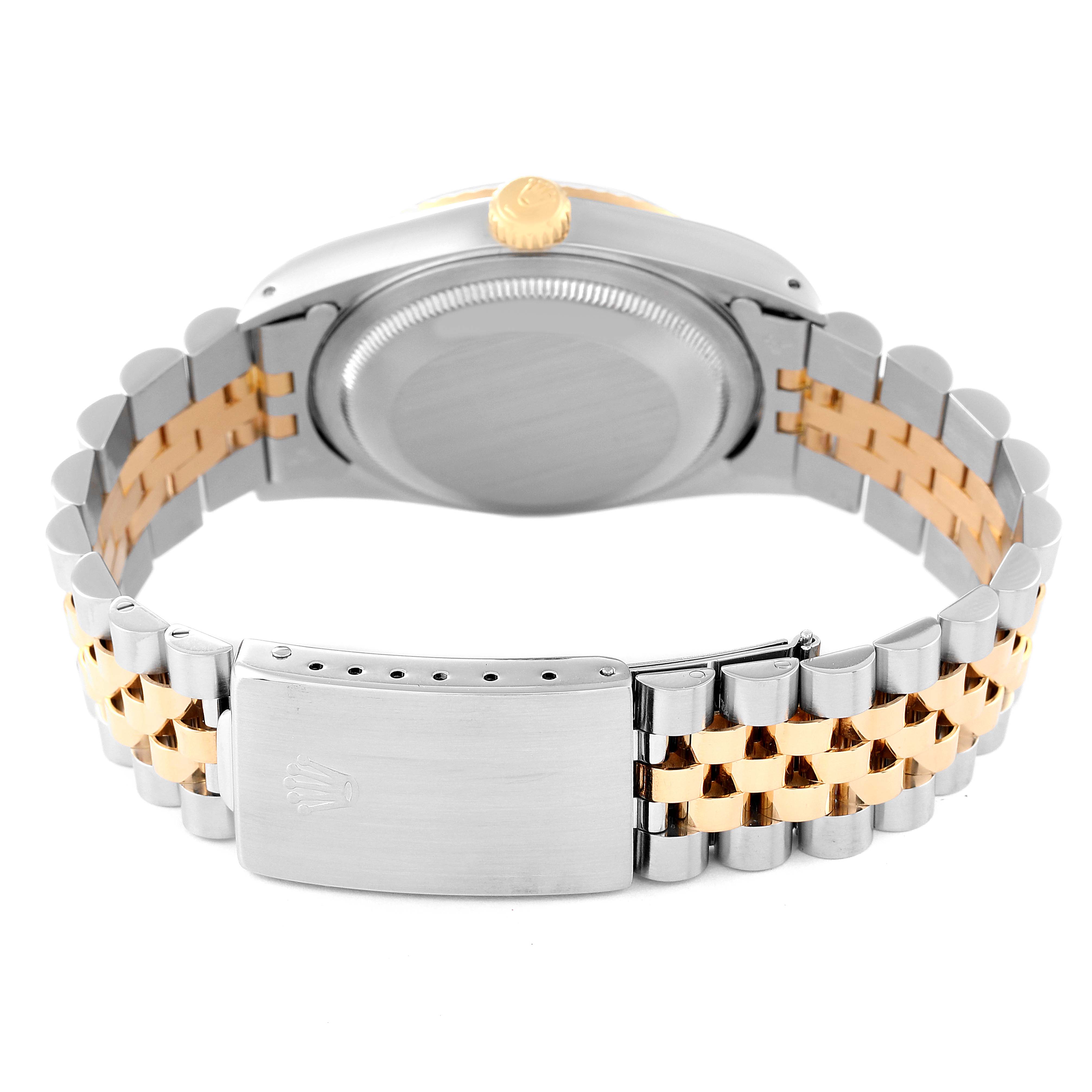 This image shows the back view of a Rolex Datejust 16233 Men's Steel and Gold (two tone) Champagne Dial 16233 Men's Steel and Gold (two tone) Champagne Dial watch, highlighting the case back, crown, and two-tone Jubilee bracelet with a clasp.