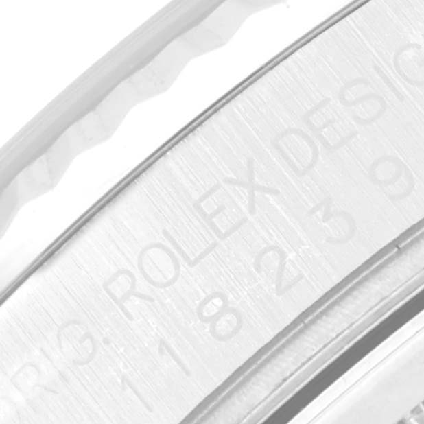 This image shows a close-up of the inner bezel and part of the outer bezel of a Rolex President 118239 Men's White Gold Silver Dial 118239 Men's White Gold Silver Dial model watch.