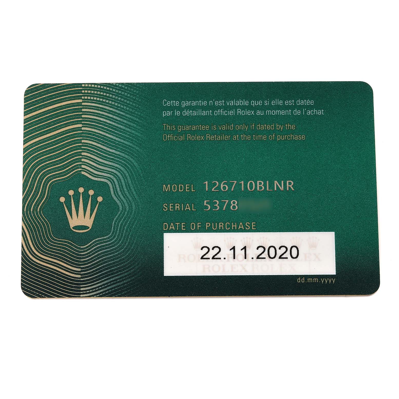 The image shows a guarantee card for the Rolex GMT-Master 126710BLNR Men
s Stainless Steel Black Dial 126710BLNR Men
s Stainless Steel Black Dial model 126710BLNR, including the serial number and date of purchase.