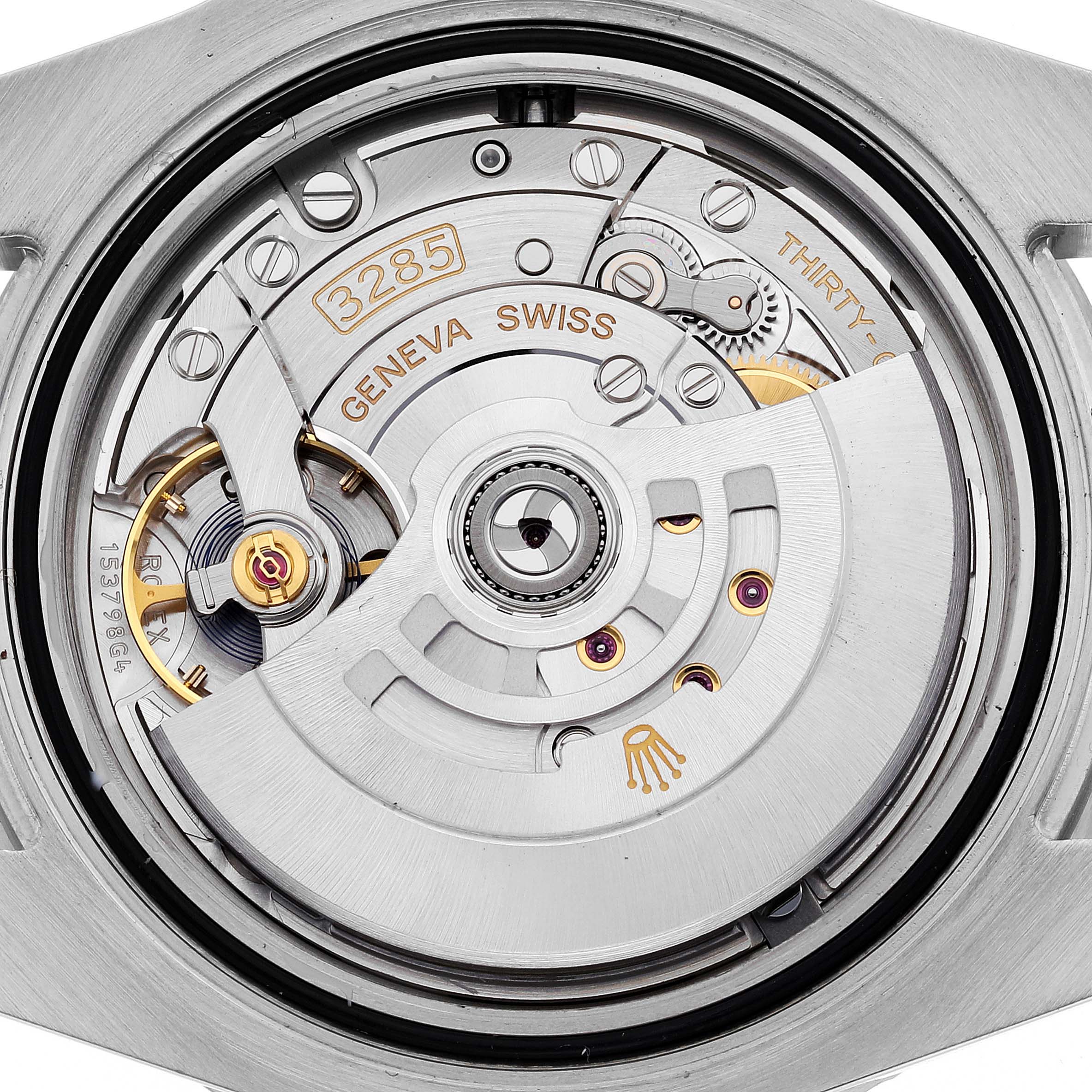 This image shows a close-up view of the movement mechanism inside a Rolex GMT-Master 126710BLNR Men
s Stainless Steel Black Dial 126710BLNR Men
s Stainless Steel Black Dial watch, highlighting the rotor and internal gears.