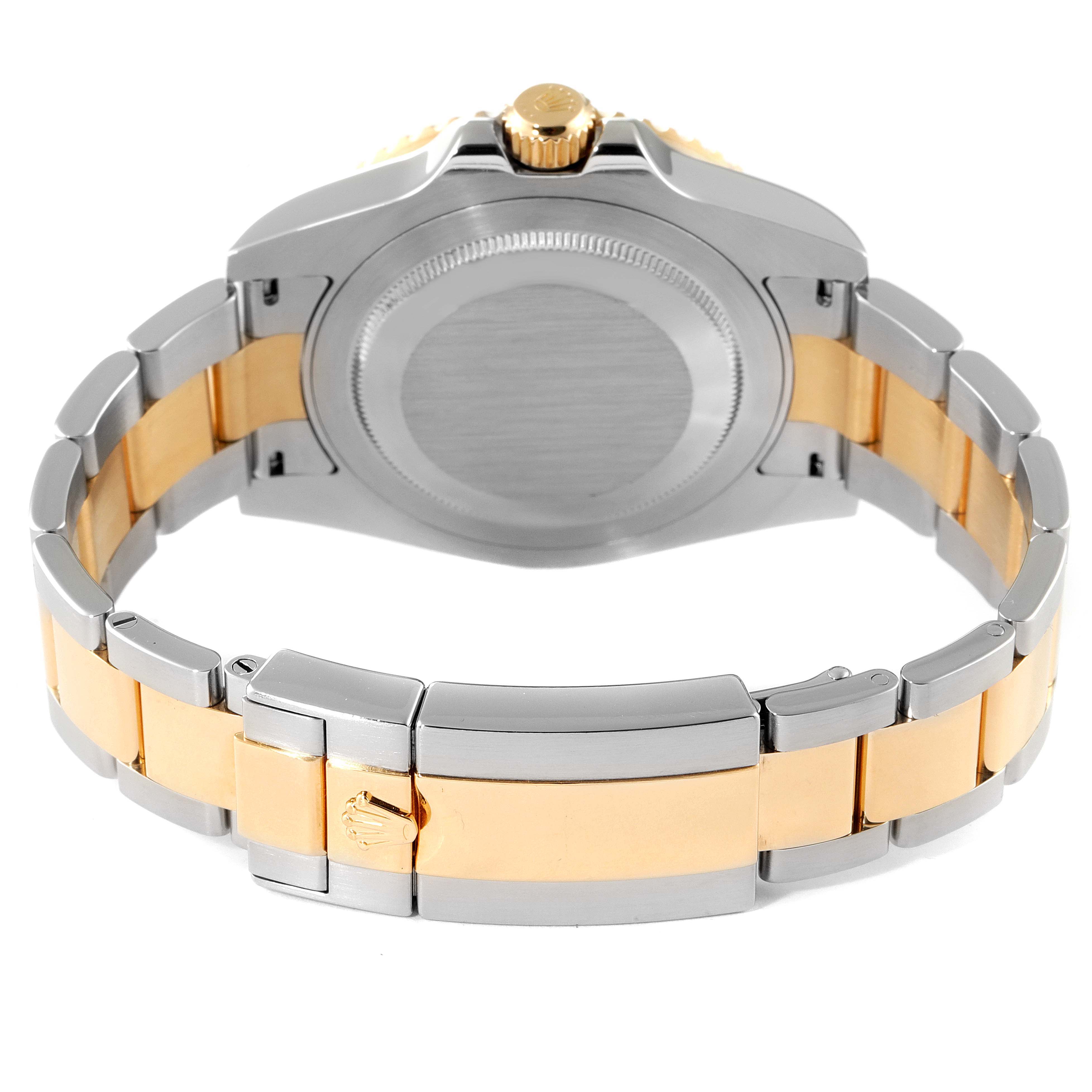 The image shows the back and bracelet of a Rolex GMT-Master 116713 Men's Steel and Gold (two tone) Black Dial 116713 Men's Steel and Gold (two tone) Black Dial watch, highlighting the clasp and caseback.