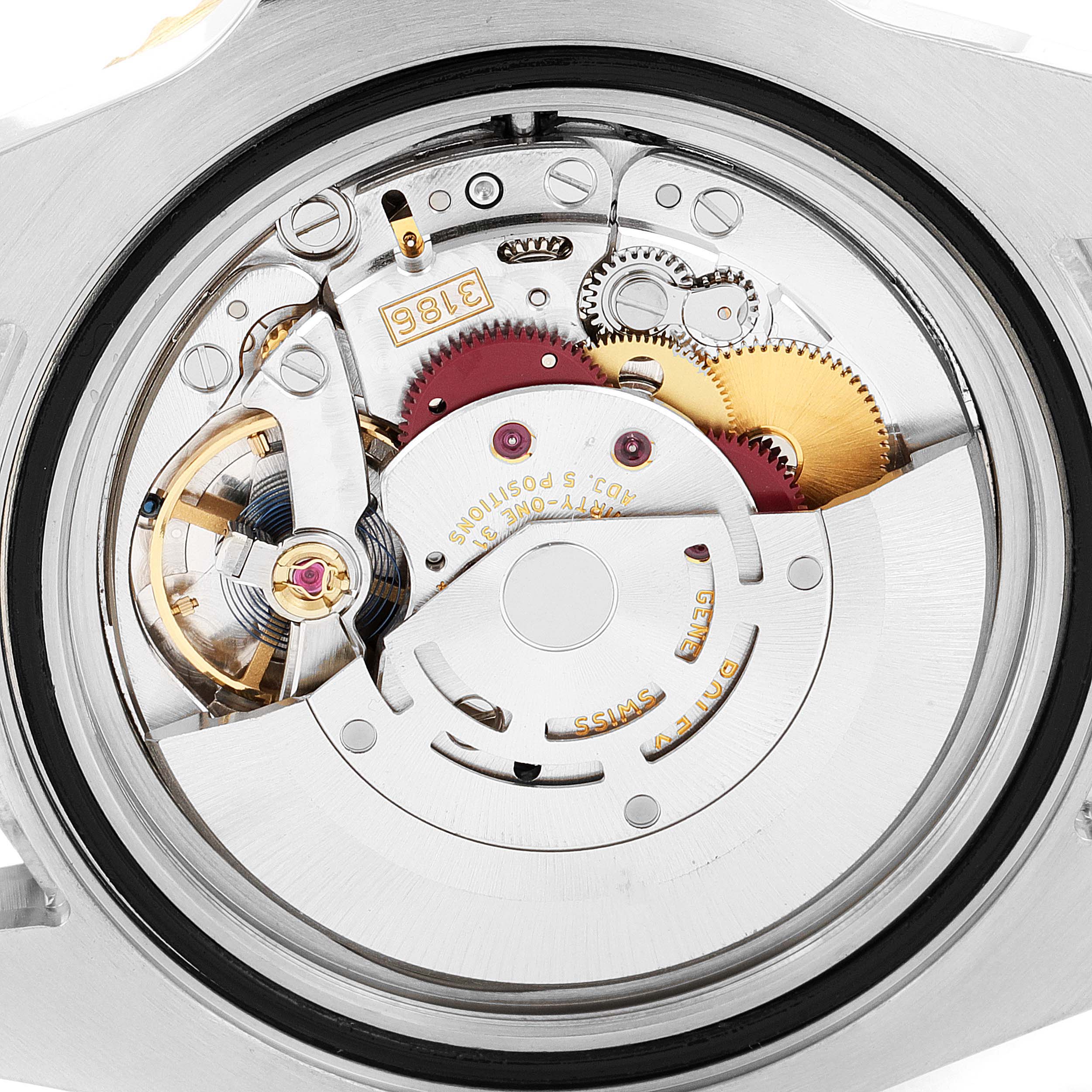 This image shows the back view of the Rolex GMT-Master 116713 Men's Steel and Gold (two tone) Black Dial 116713 Men's Steel and Gold (two tone) Black Dial's movement, highlighting its intricate internal mechanisms.