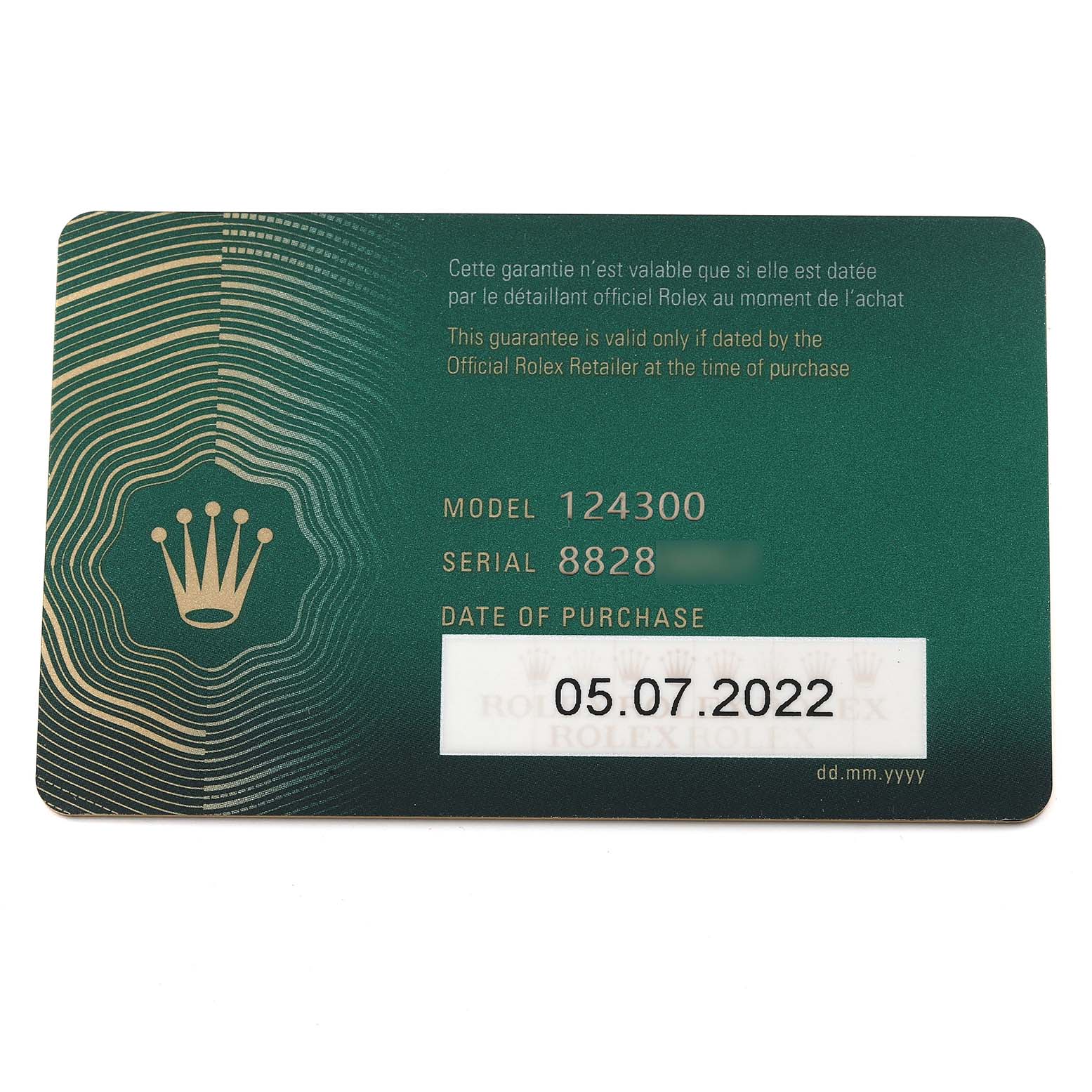 This image shows a warranty card for the Rolex Oyster Perpetual 124300 Men's Stainless Steel Silver Dial 124300 Men's Stainless Steel Silver Dial model 124300 with the purchase date and serial number.