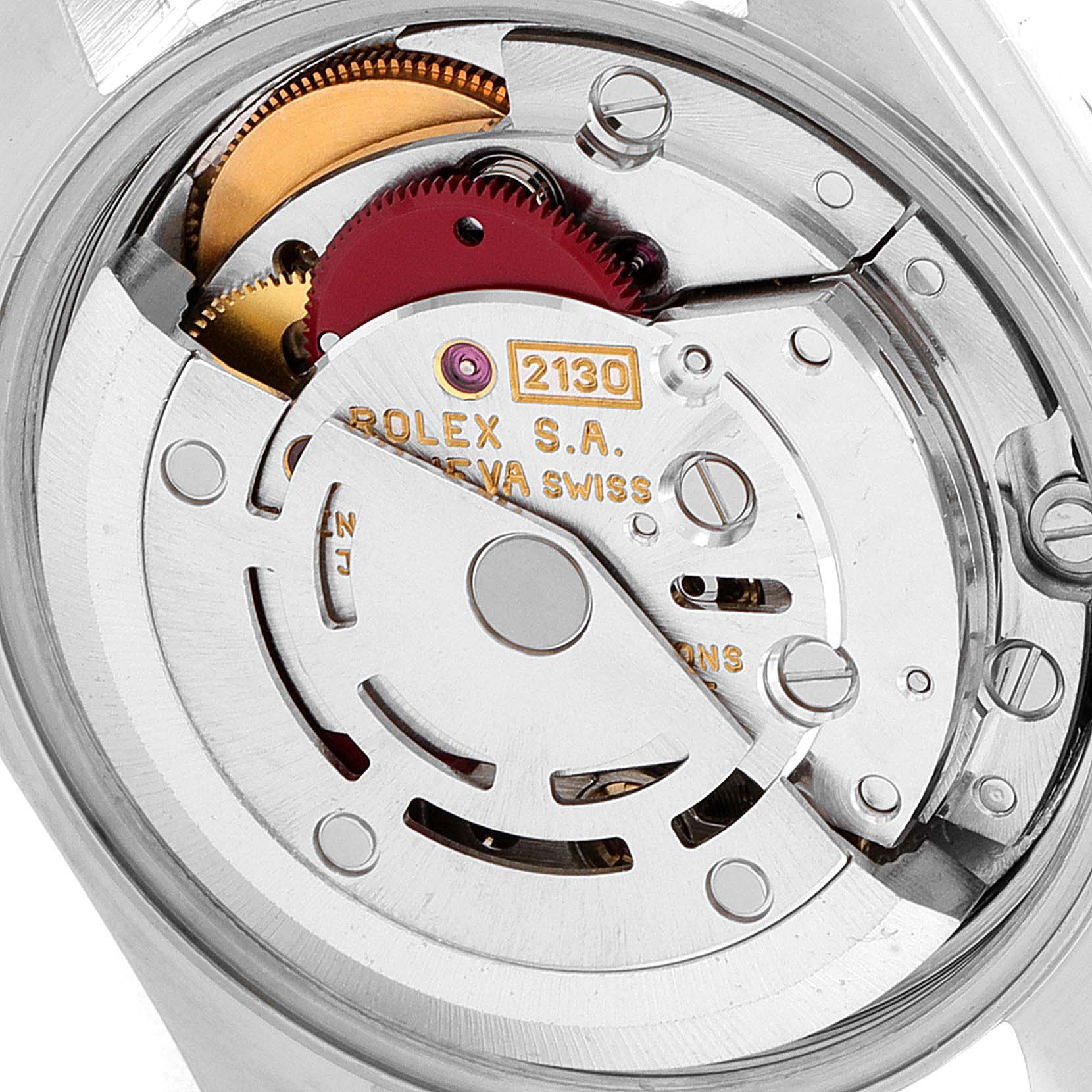 This image shows the intricate internal mechanics of a Rolex Oyster Perpetual 67193 Women's Steel and Gold (two tone) Black Dial 67193 Women's Steel and Gold (two tone) Black Dial watch from a top view.