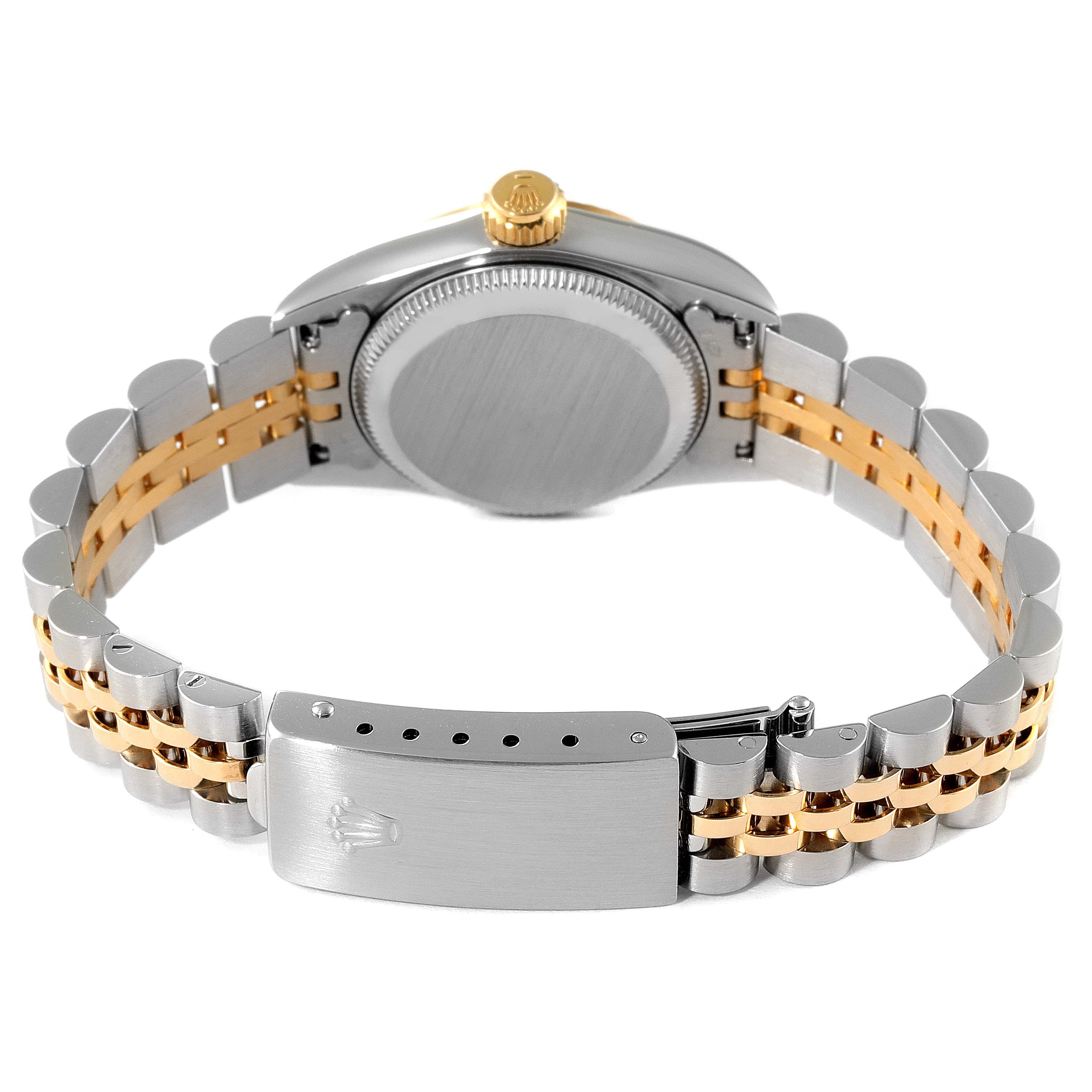 This image shows the back view of a Rolex Oyster Perpetual 67193 Women's Steel and Gold (two tone) Black Dial 67193 Women's Steel and Gold (two tone) Black Dial watch, highlighting its case back, bracelet, and clasp.