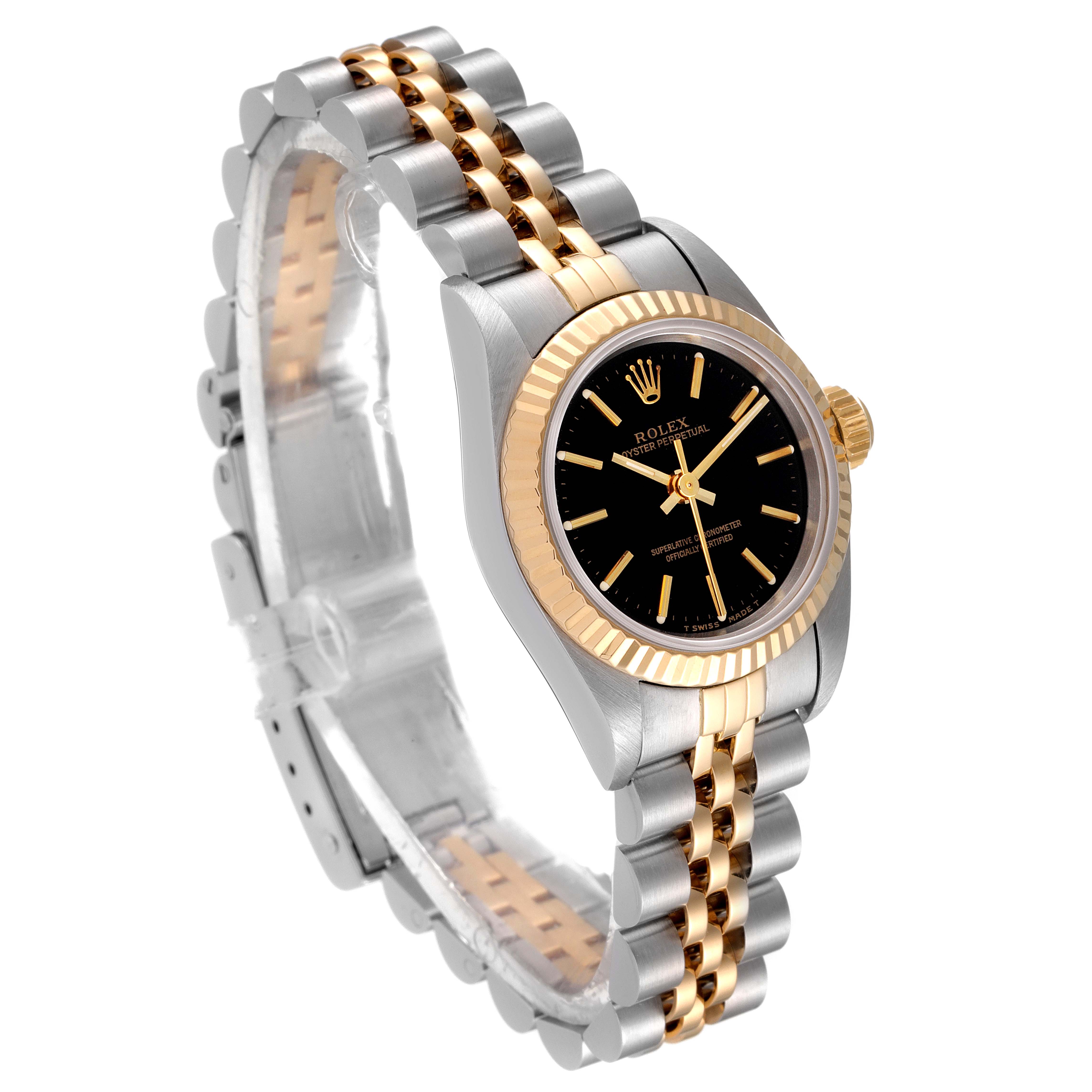 This image shows a Rolex Oyster Perpetual 67193 Women's Steel and Gold (two tone) Black Dial 67193 Women's Steel and Gold (two tone) Black Dial watch at a three-quarter angle, highlighting the black dial, and two-tone bracelet.