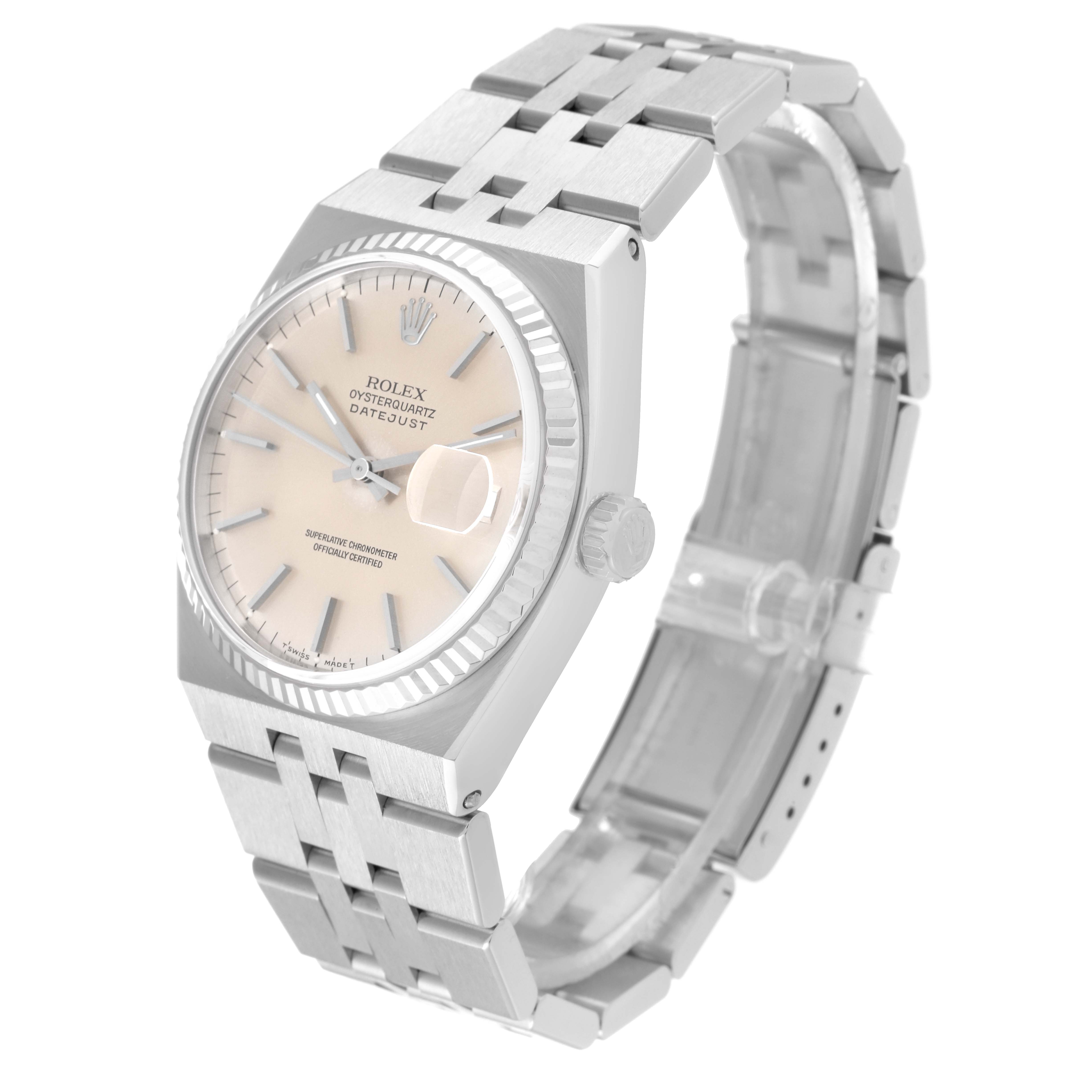 The Rolex Oysterquartz 17014 Men
s Stainless Steel Silver Dial 17014 Men
s Stainless Steel Silver Dial watch is shown from a three-quarter angle, highlighting its face, bezel, crown, and bracelet.