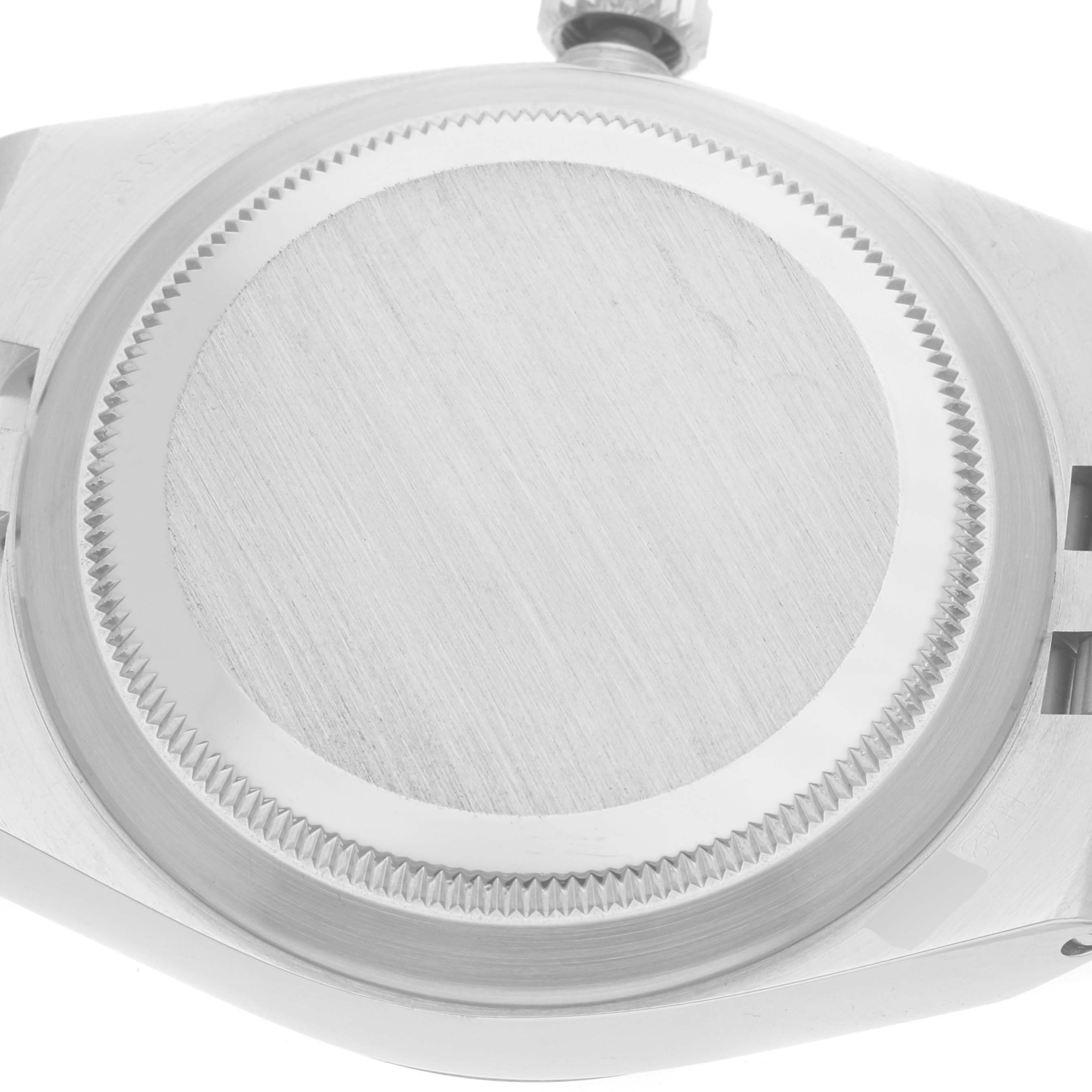 This image shows the back casing of a Rolex Oysterquartz 17014 Men
s Stainless Steel Silver Dial 17014 Men
s Stainless Steel Silver Dial watch, featuring the toothed edge and brushed finish.