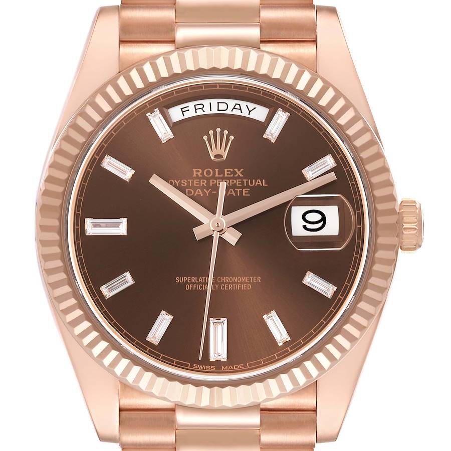 The Rolex President model watch is shown from the front, highlighting the brown dial, day-date feature, and gold bracelet.