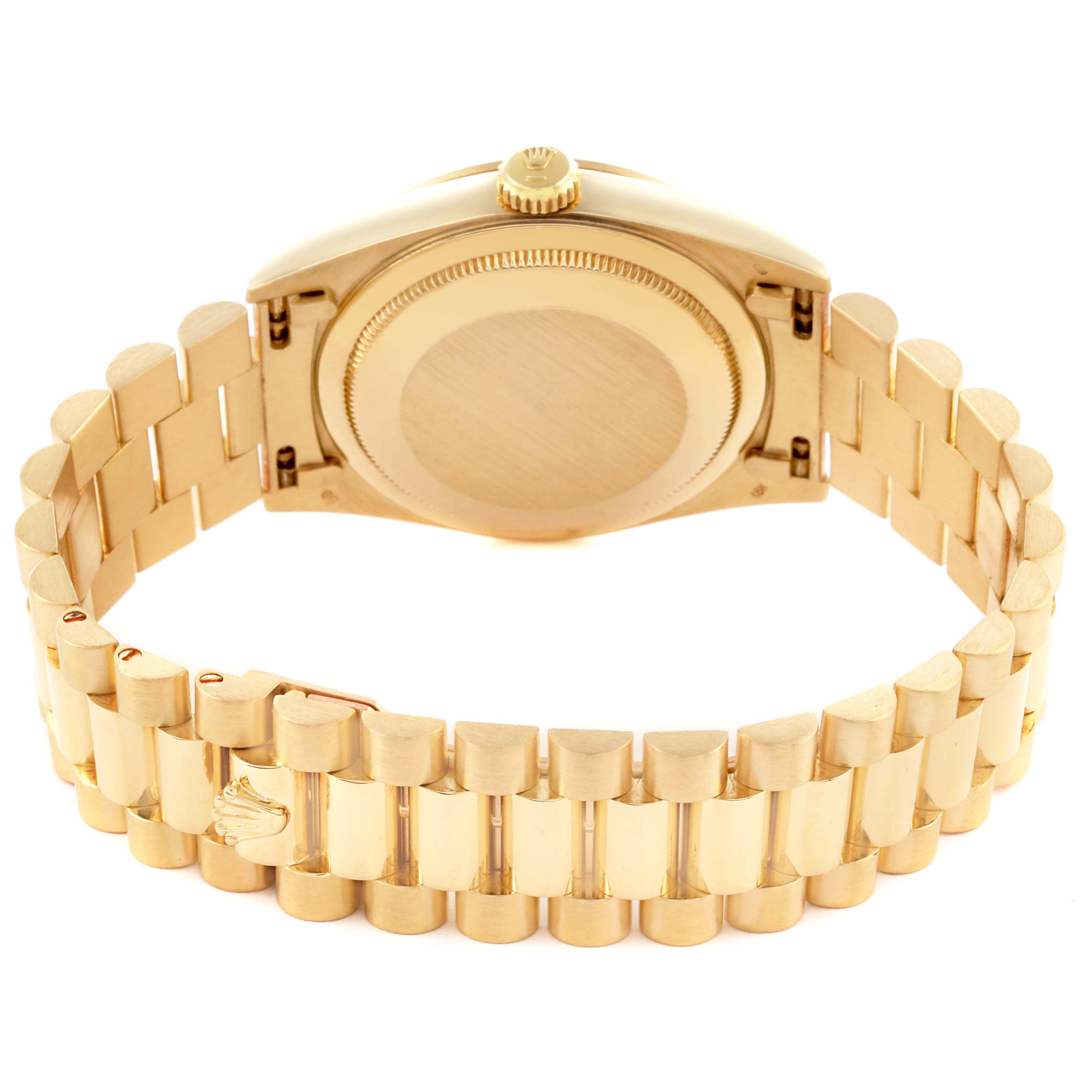 This image shows the back case and bracelet of a Rolex President 18238 Men
s Yellow Gold Champagne Dial 18238 Men
s Yellow Gold Champagne Dial model watch from a slightly angled rear view.