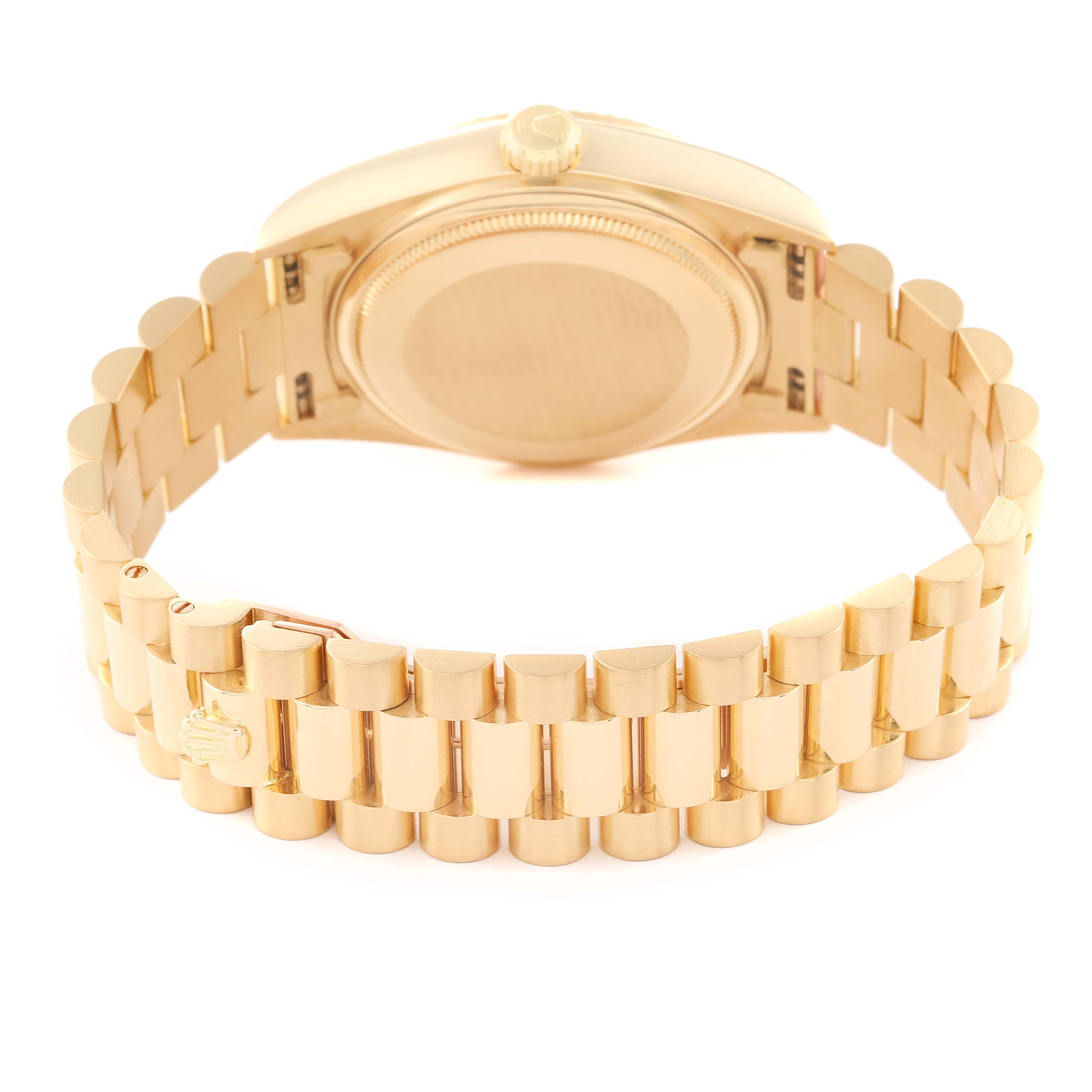 This image shows the back and bracelet of the Rolex President 18038 Men
s Yellow Gold Champagne Dial 18038 Men
s Yellow Gold Champagne Dial model watch, viewed from an angle displaying the clasp and links.