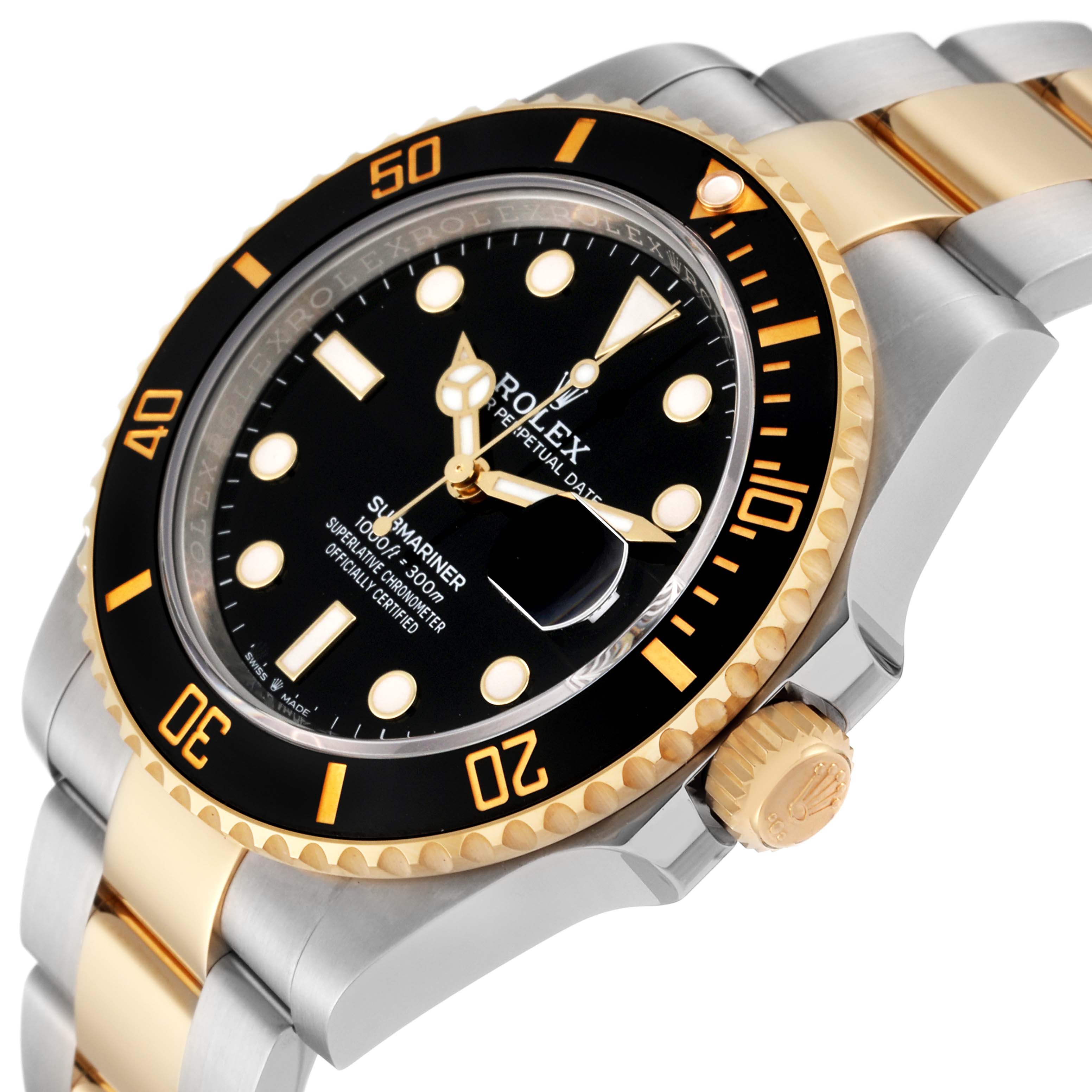 This image shows a Rolex Submariner 126613LN Men
s Steel and Gold (two tone) Black Dial 126613LN Men
s Steel and Gold (two tone) Black Dial watch from an angled side view, highlighting the bezel, dial, crown, and part of the bracelet.