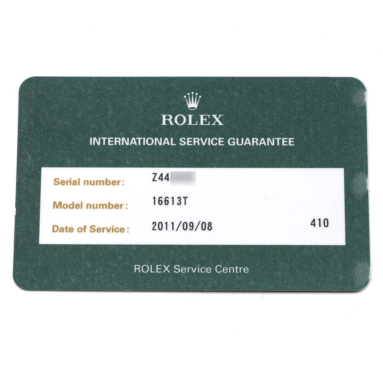 This image shows the international service guarantee card for a Rolex Submariner 16613 Men's Steel and Gold (two tone) Blue Dial 16613 Men's Steel and Gold (two tone) Blue Dial model 16613T.