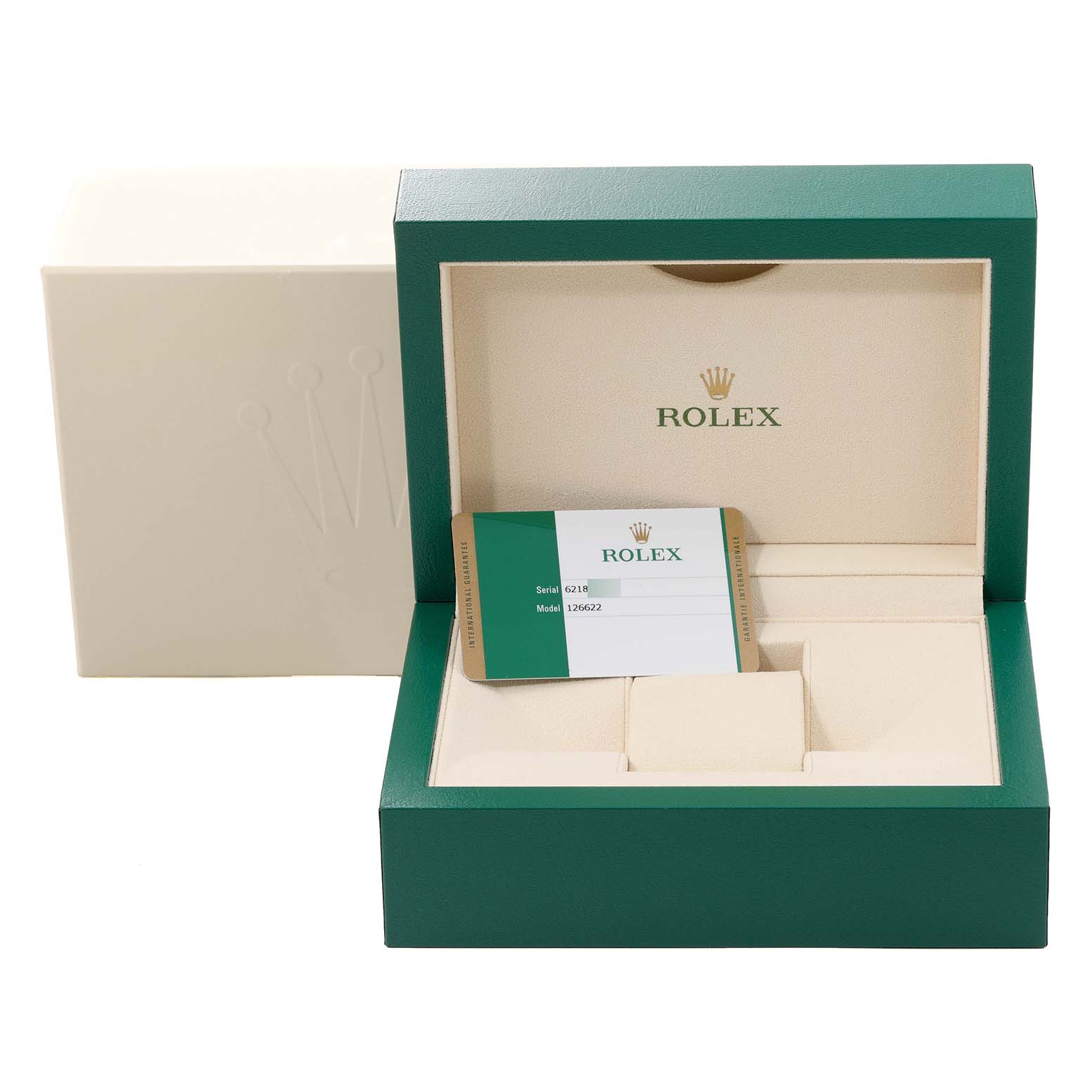 The image shows the box for a Yacht-Master model by Rolex, displaying the inner box, an outer box, and a warranty card.