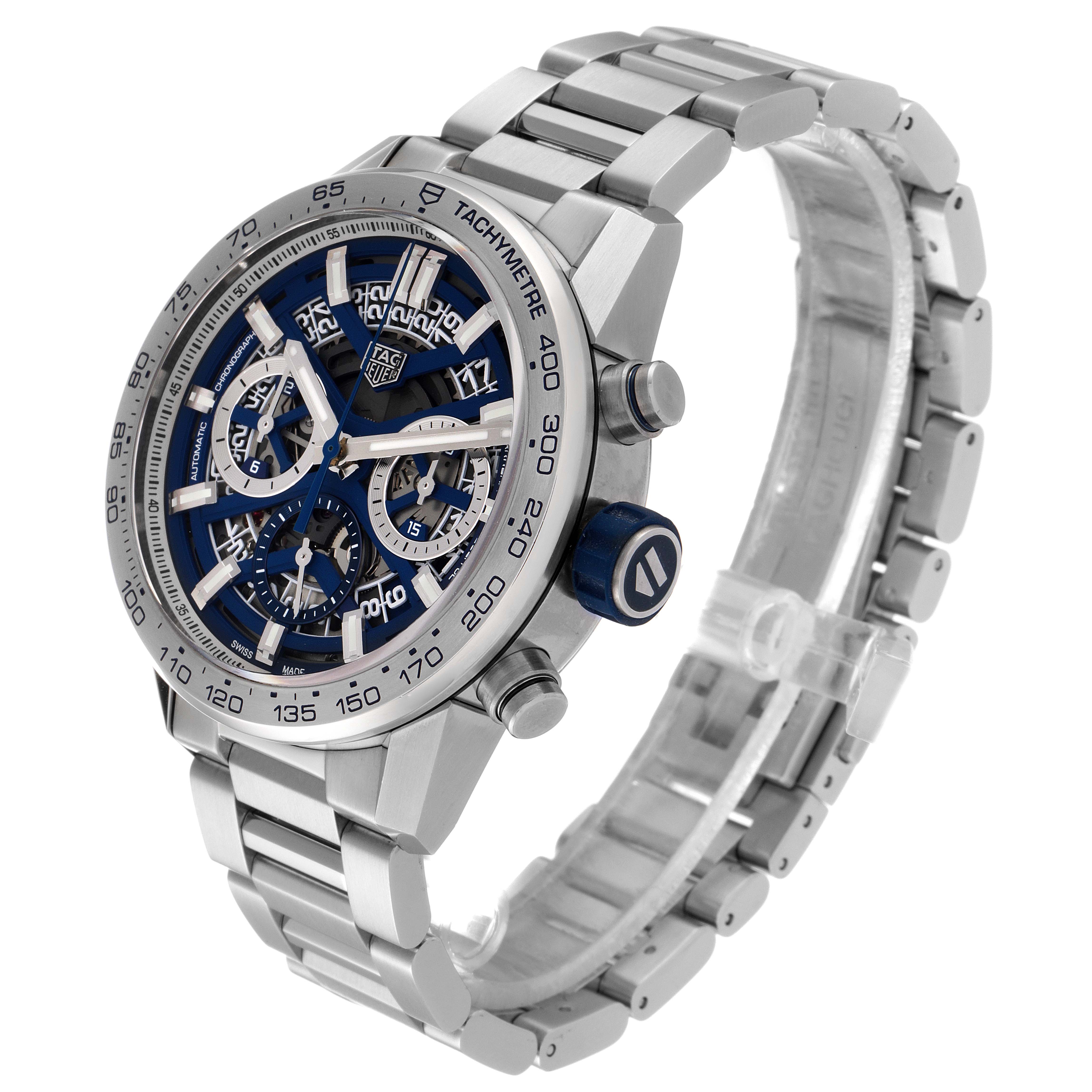 The image shows a side view of a Tag Heuer Carrera watch, highlighting the face, bezel, and bracelet.